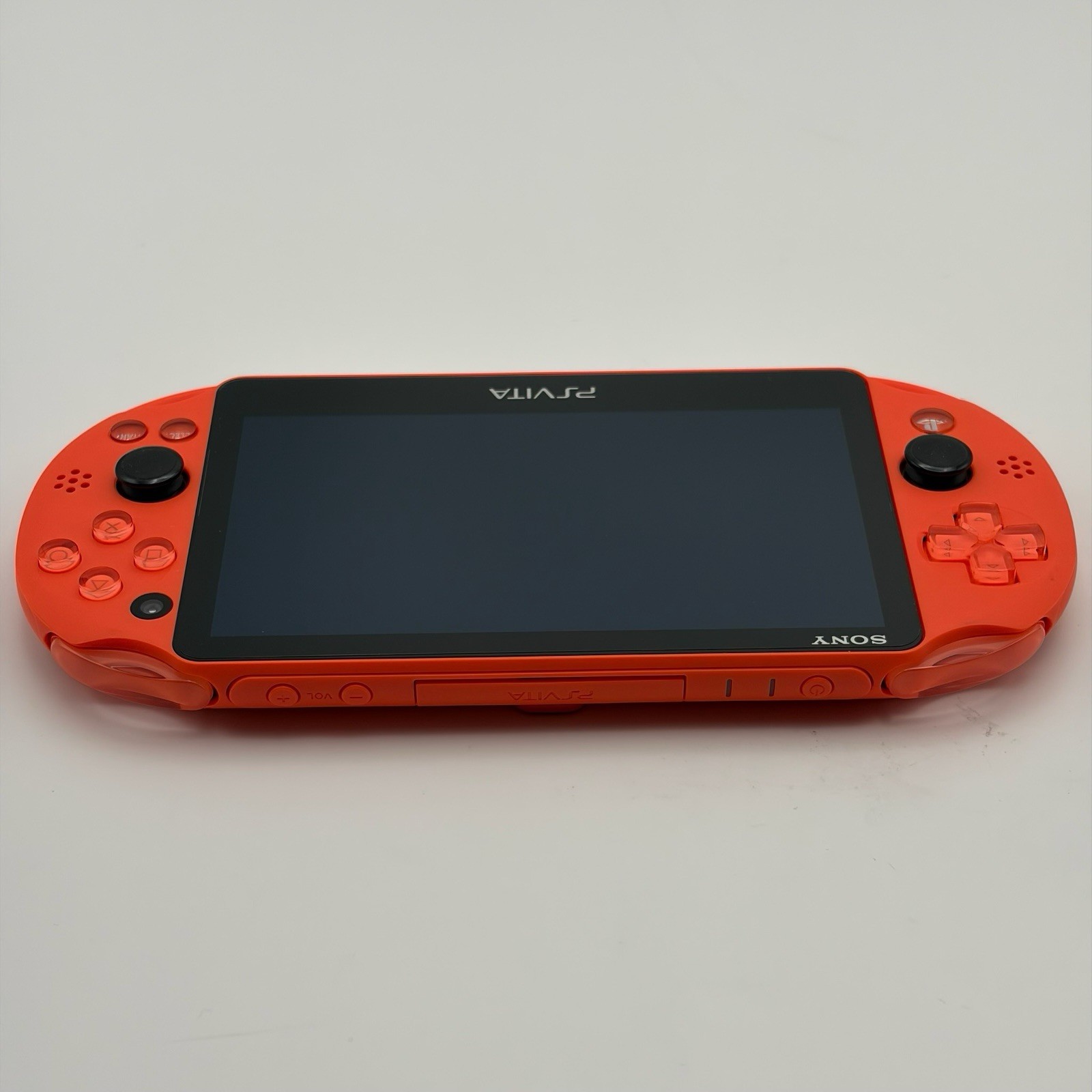 SONY PS Vita PCH-2000 Console Orange Very Good Fast Shipping No joystick drift.