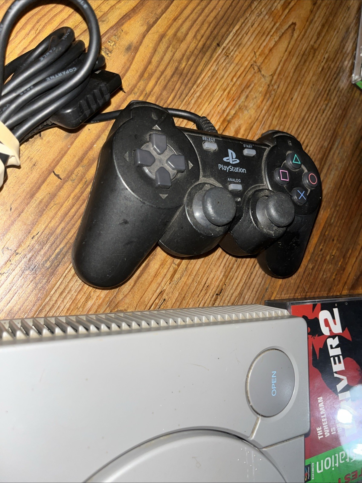 Sony Playstation 1 Gray Console With Games Controllers, A/V Cable, and Power