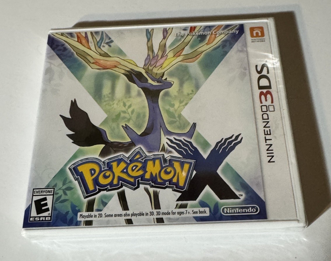 NINETENDO 3DS XL CONSOLE WITH 15 GAMES IN CASES & MANUALS 9 GAMES NO CASES