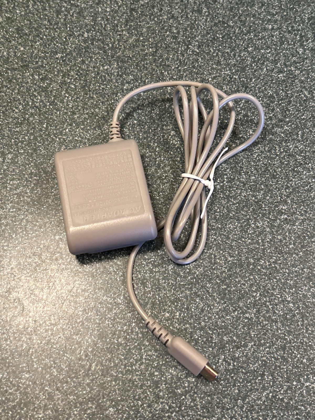DS Lite includes charger, stylus, and case but game not included