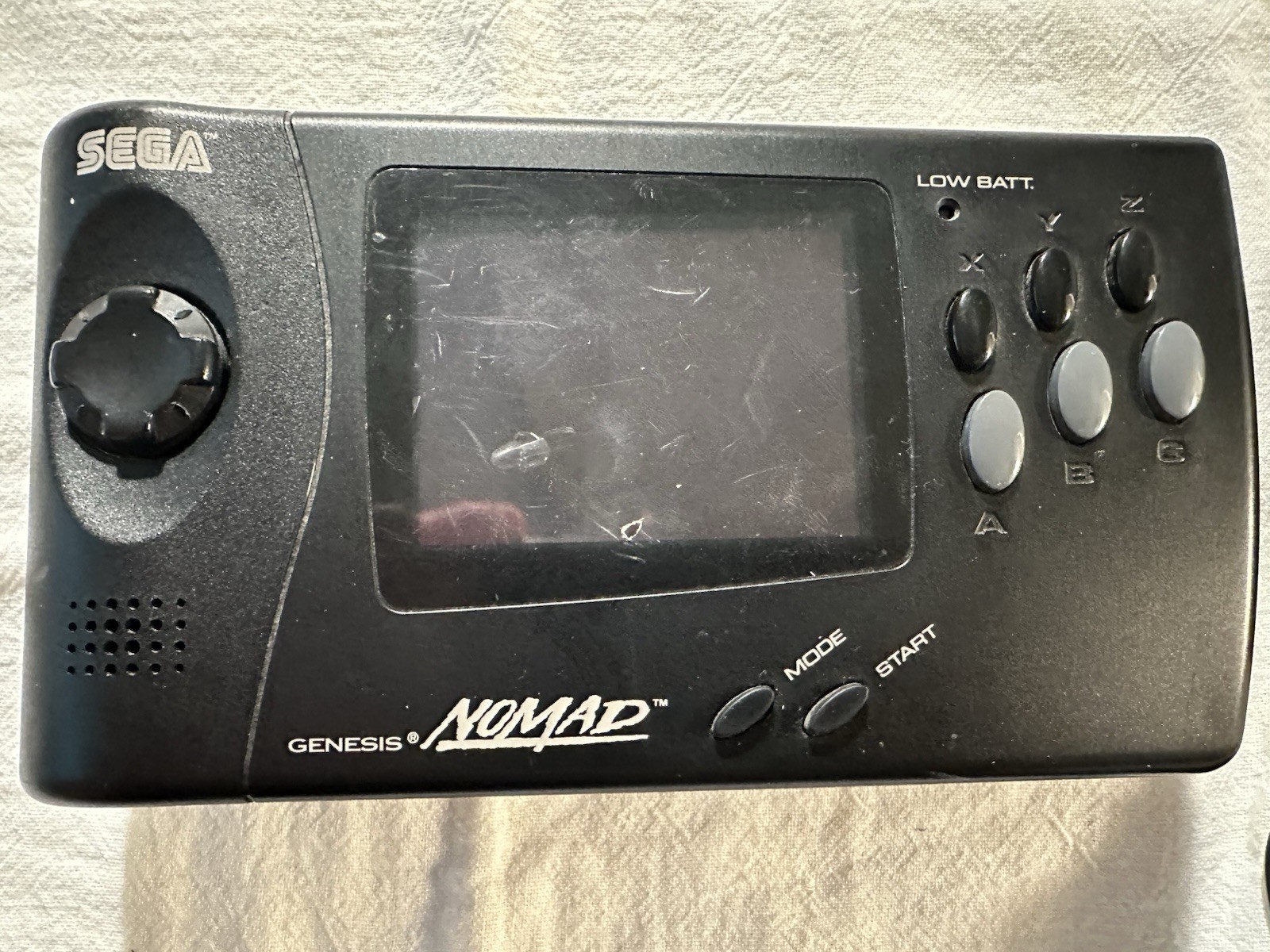 SEGA Genesis Nomad MK-6100 Handheld System W/ power supply. Tested runs great.