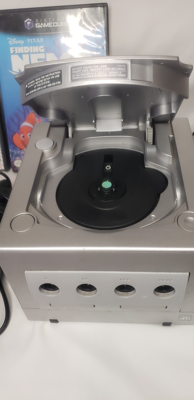 GameCube with 3 remotes, 2 games, cords, and remotes!