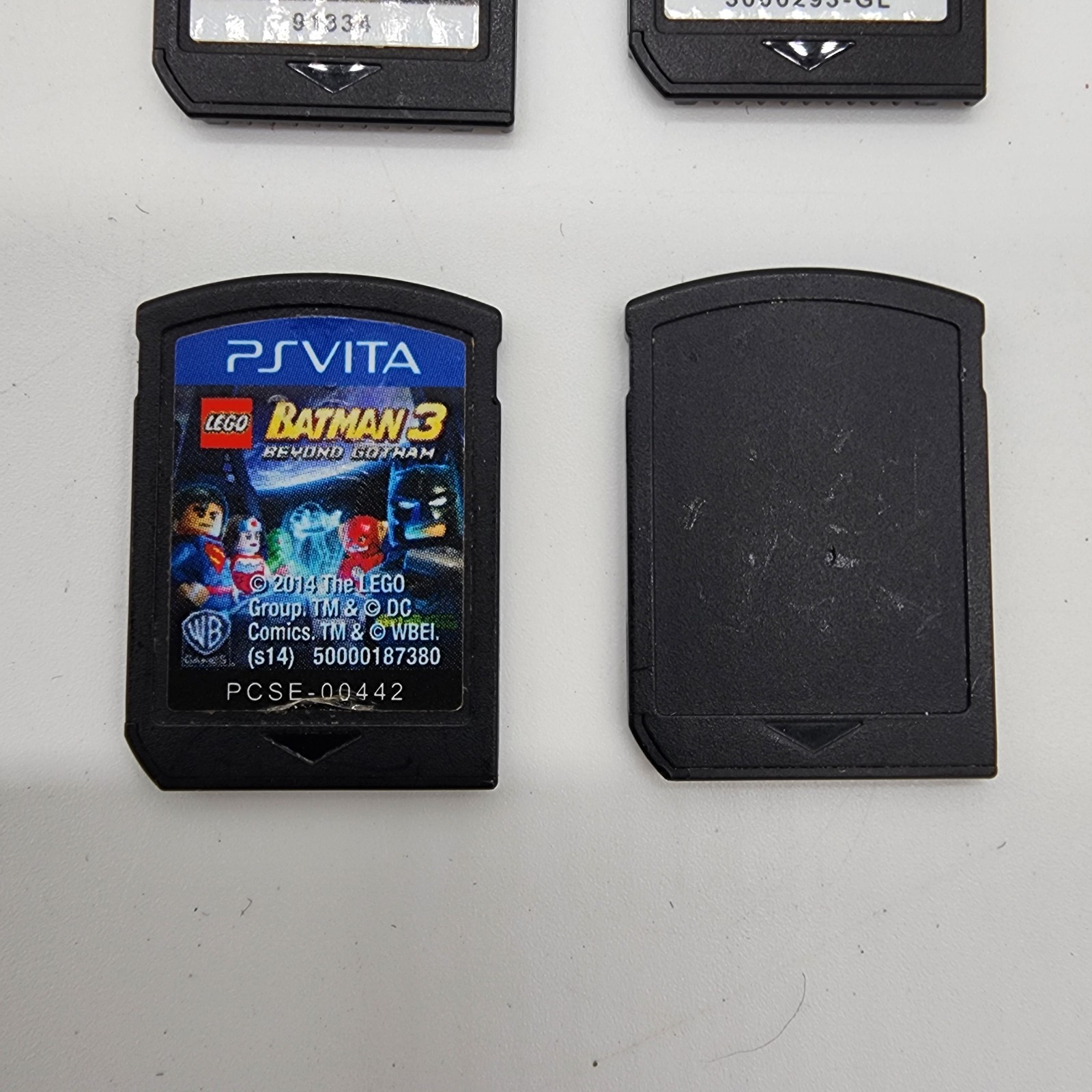 PlayStation PS Vita PCH-1001 Bundle – 5 Games, Memory Card, 8 GB Charger