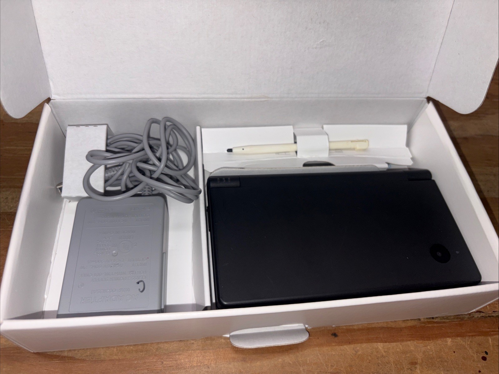Nintendo DSi Black Handheld System in Box with Charger and Replacement Stylus