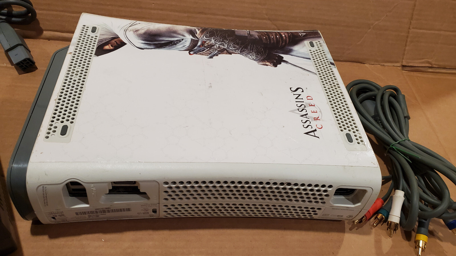 Microsoft Xbox 360 Pro 20GB Video Game Console – White with assassin creed skin