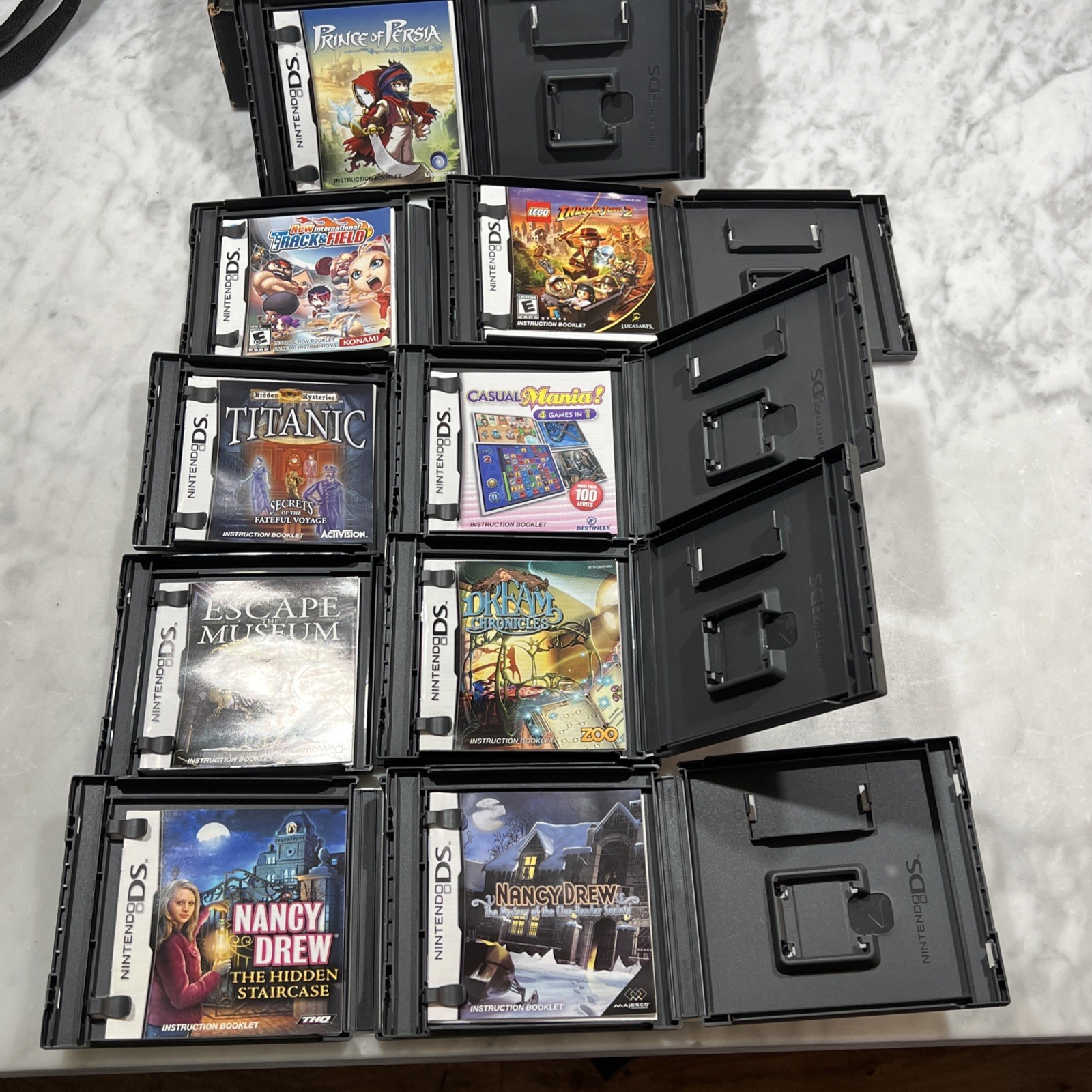 Nintendo DS Lite Cobalt Blue Console Bundle 9 Games New Battery Charger Cases