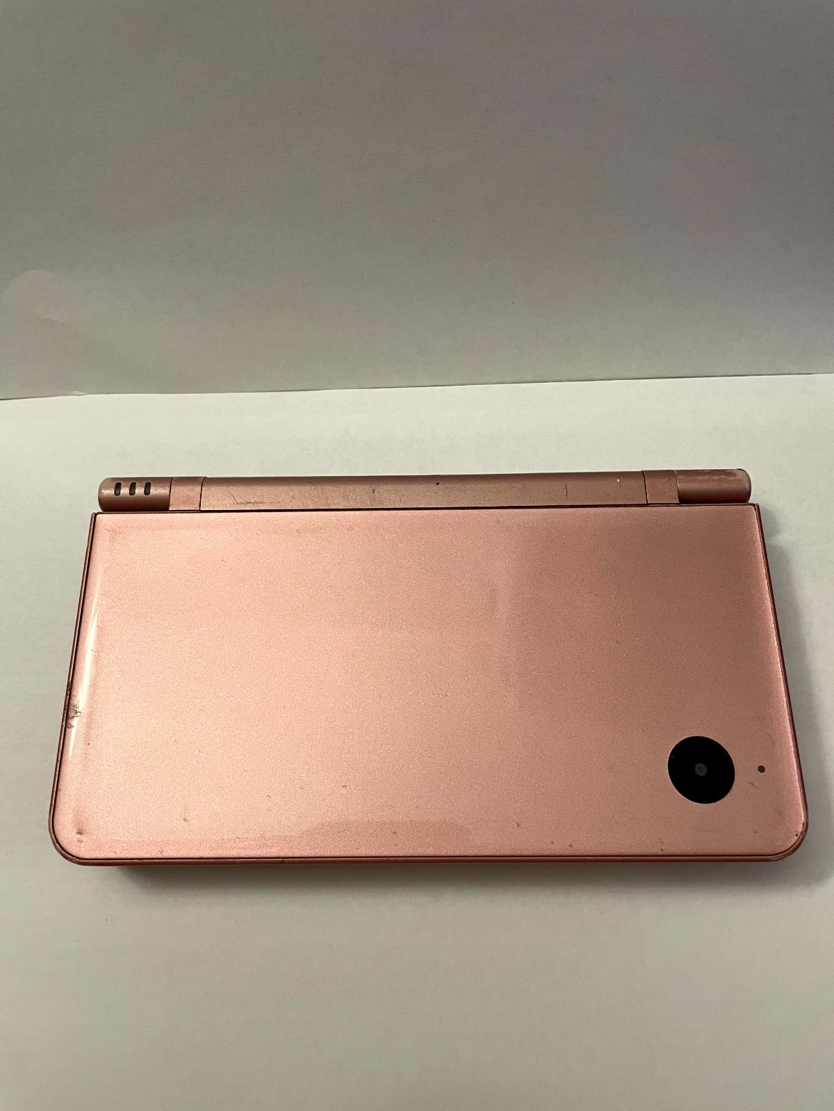 WORKING! Nintendo DSi XL Metallic Rose Pink UTL-001: NO STYLUS SD CARD CHARGER!