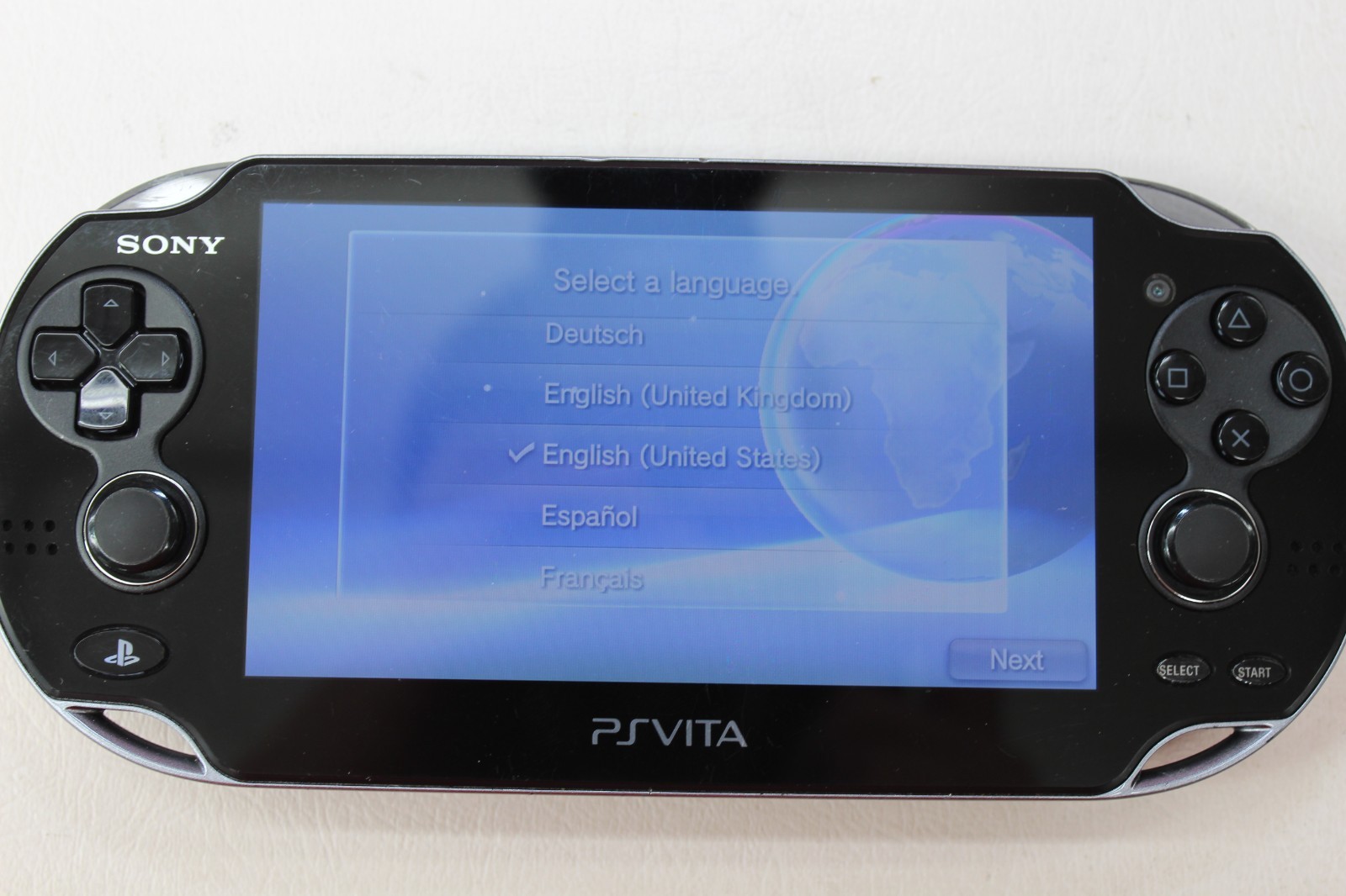 Sony PS Vita PCH-1001 Black Handheld System w/ Charger & 4GB SD Card