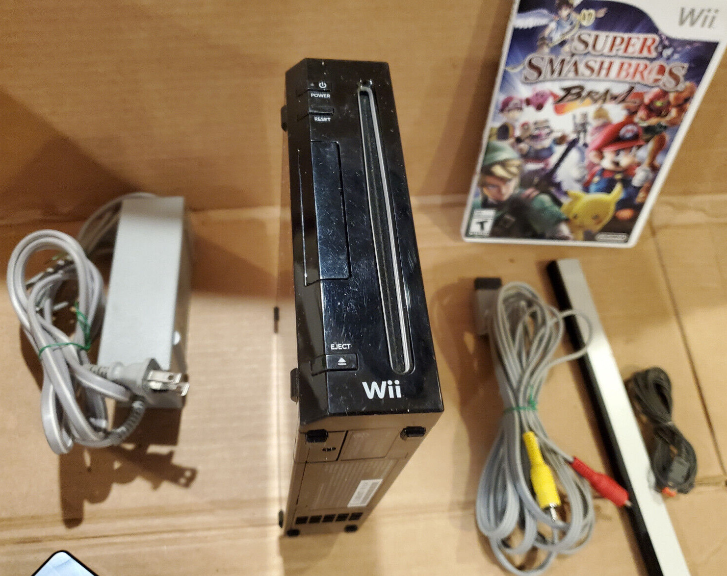 Nintendo Wii Console in Black, Gamecube Compatible + super smash bros brawl game