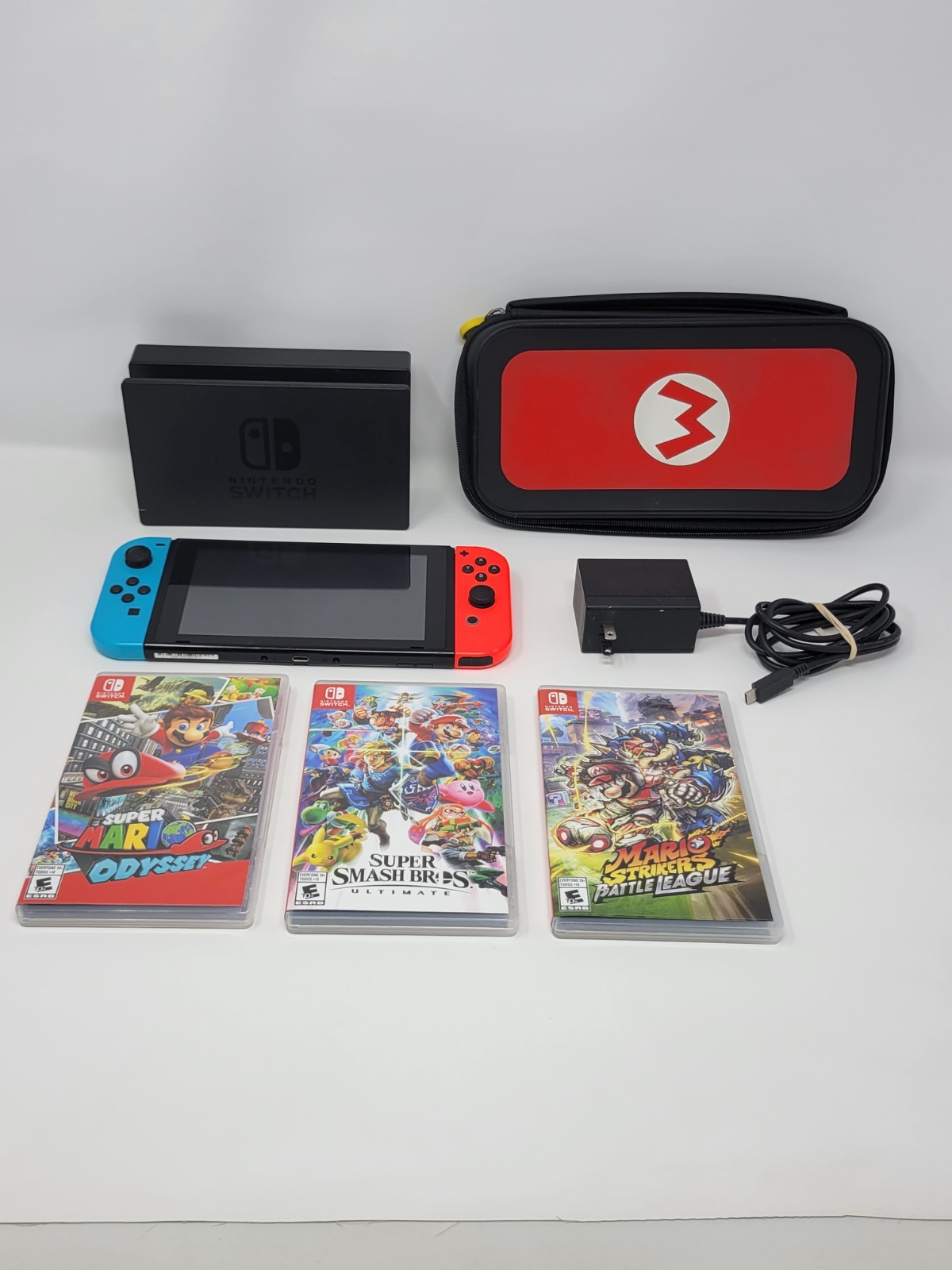 Nintendo Switch Console Neon Blue Red Joycons w/ Mario Odyssey Smash & Strikers