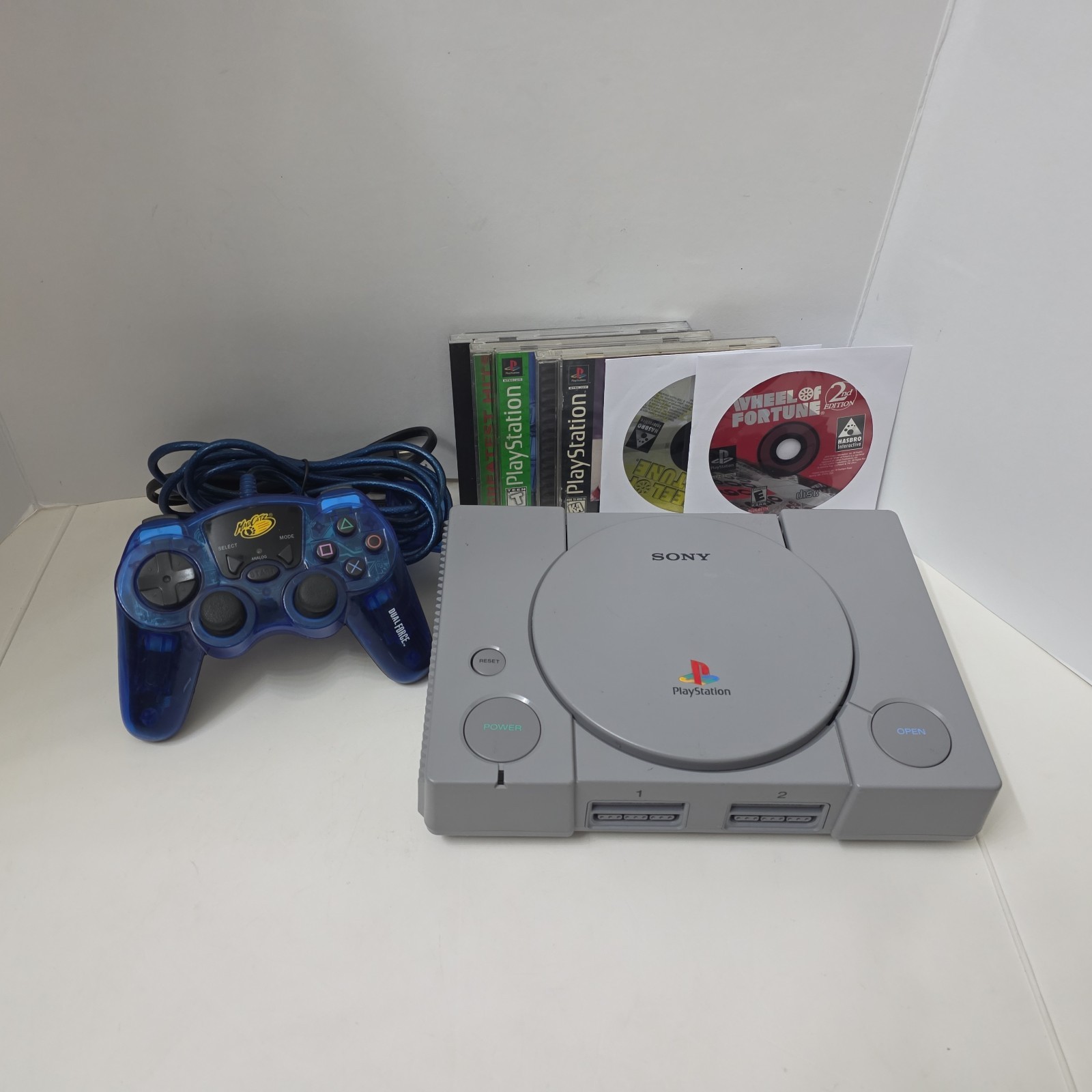 Sony Playstation 1 PS1 Console Bundle 8 Games, Remote, Power + AV Tested