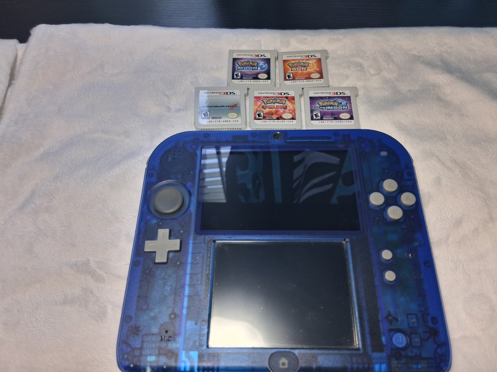Nintendo 2DS Transparent Blue + 8 Games Limited edition Sapphire Handheld System