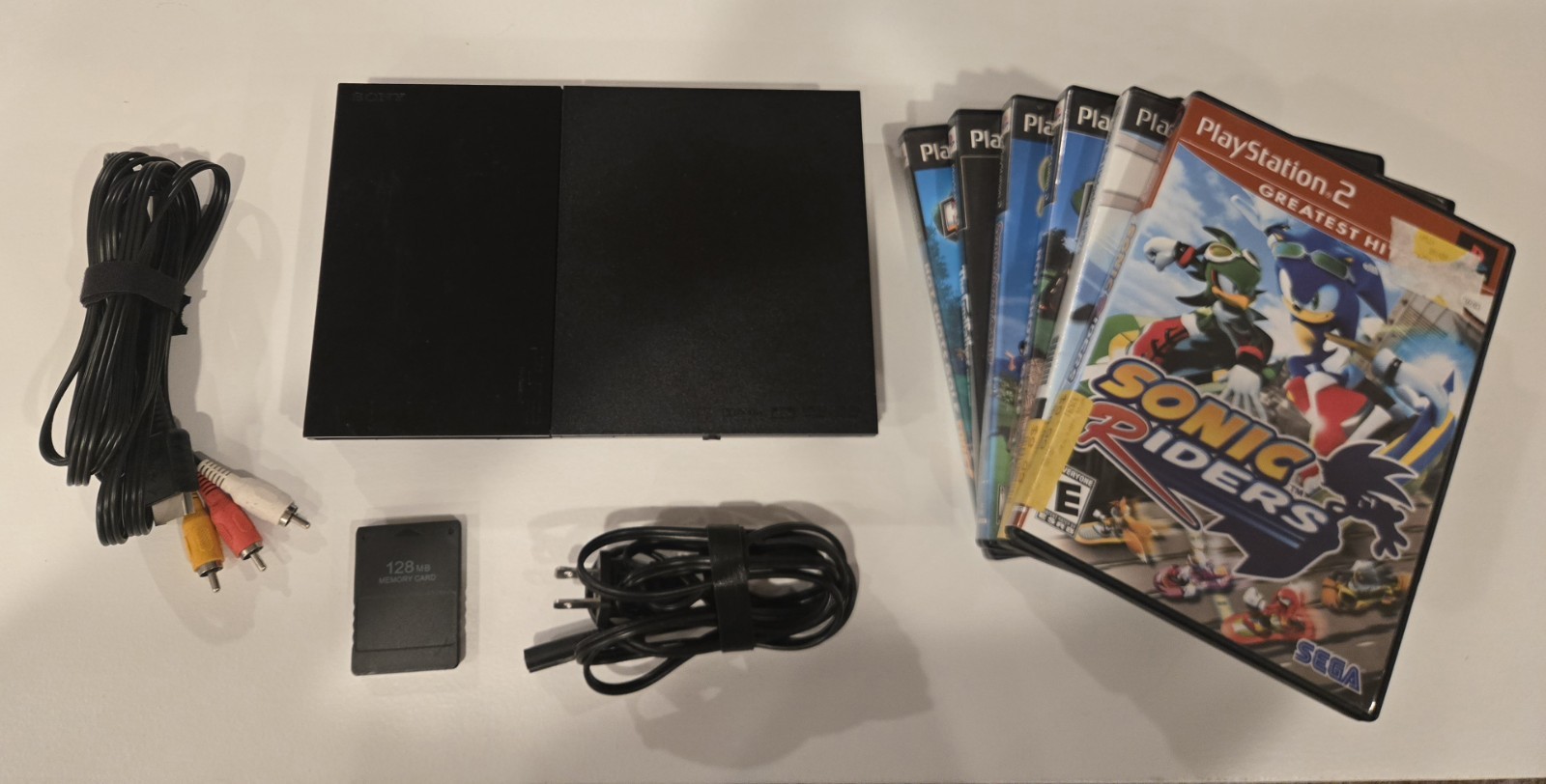 Sony PlayStation 2 Slim Black Bundle 128MB Memory W/ Controller, 6 Games, Cables