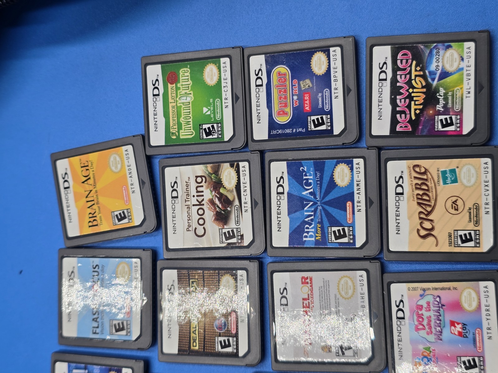 Nintendo DSi XL Blue Console Bundle w/ Charger Case Stylus & 15 Games Tested