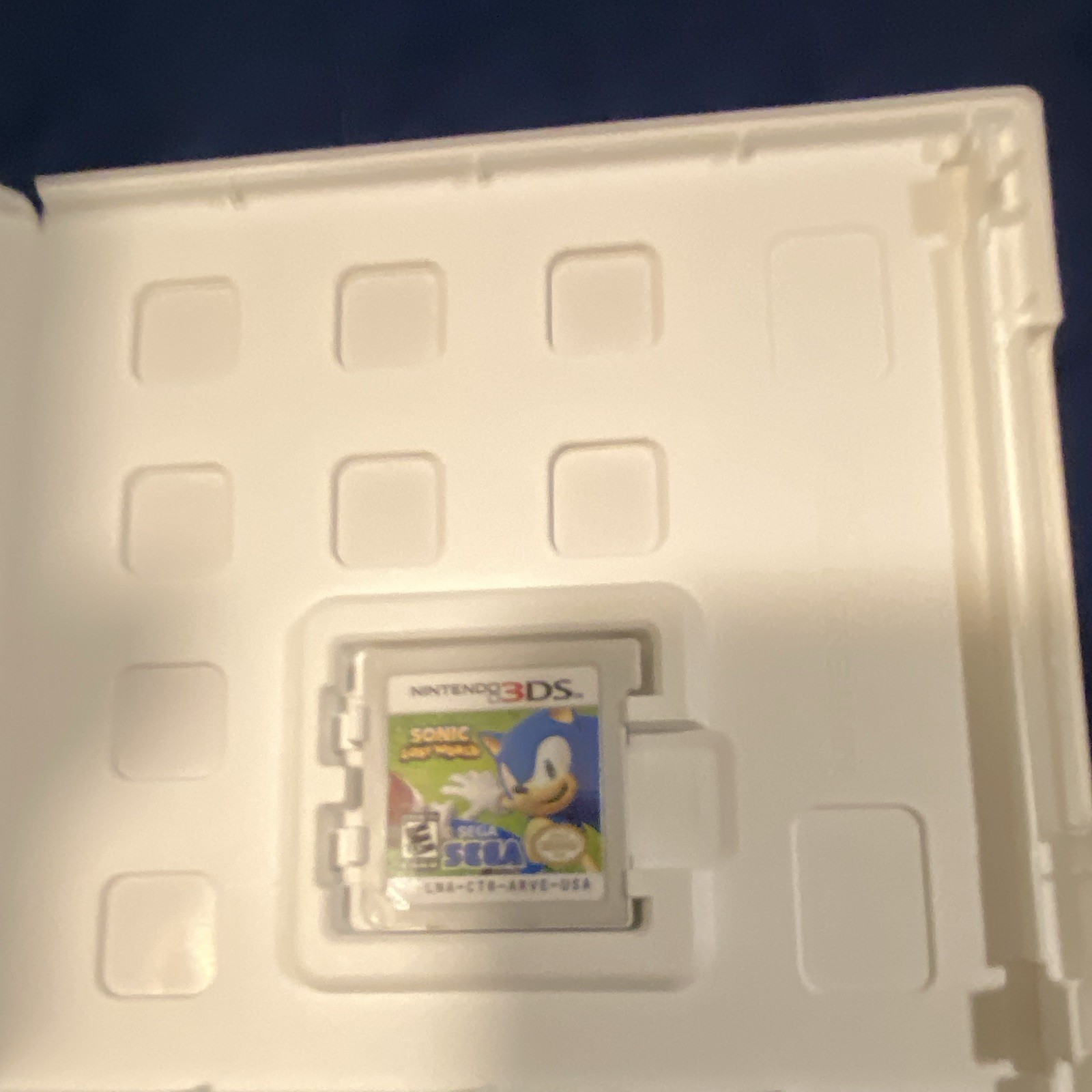 Nintendo DSi XL Blue Handheld System Touchscreen w/ Charger and sonic game