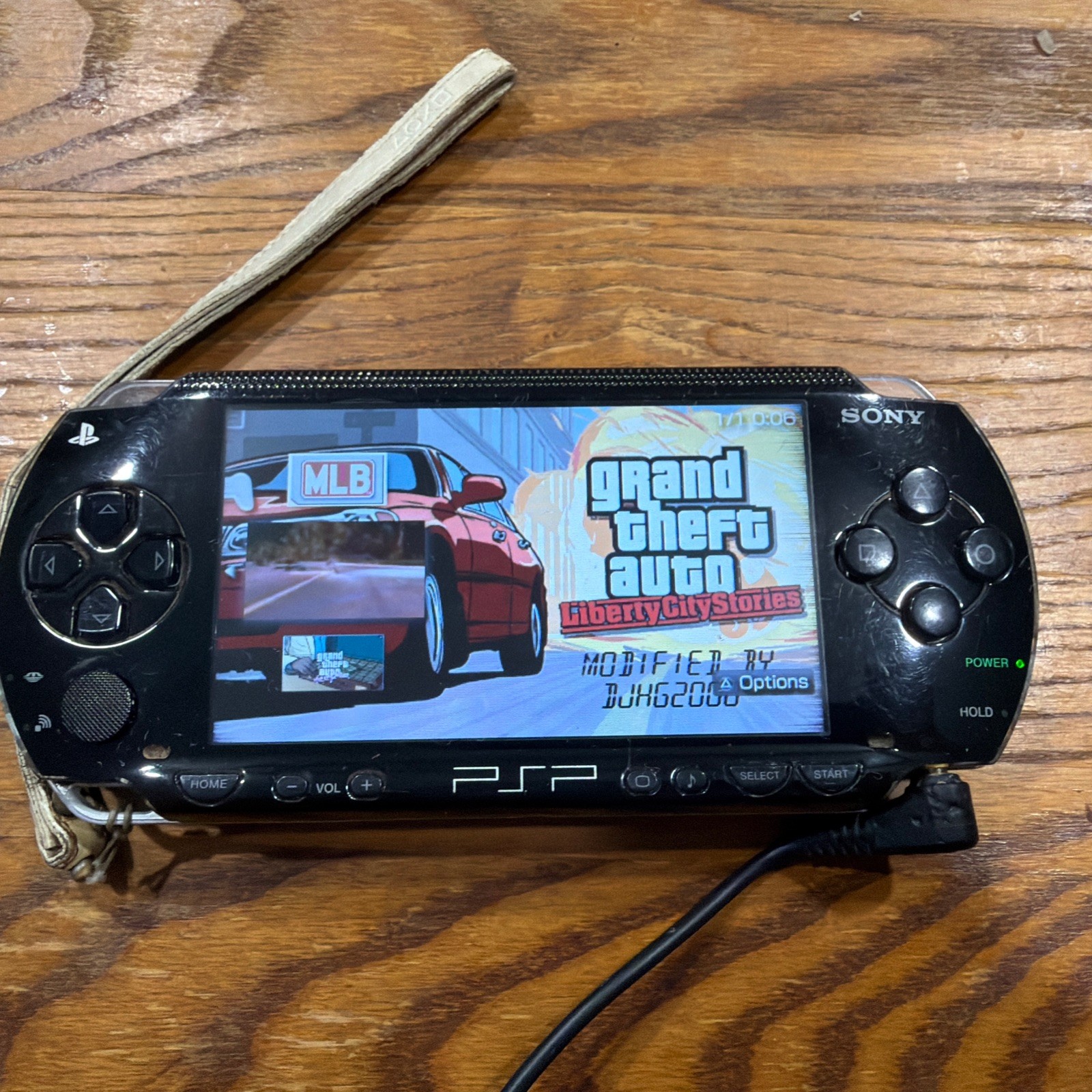 PSP 1001 – Missing Battery – Needs Charger Cord – Comes w/ Games – See Disc.