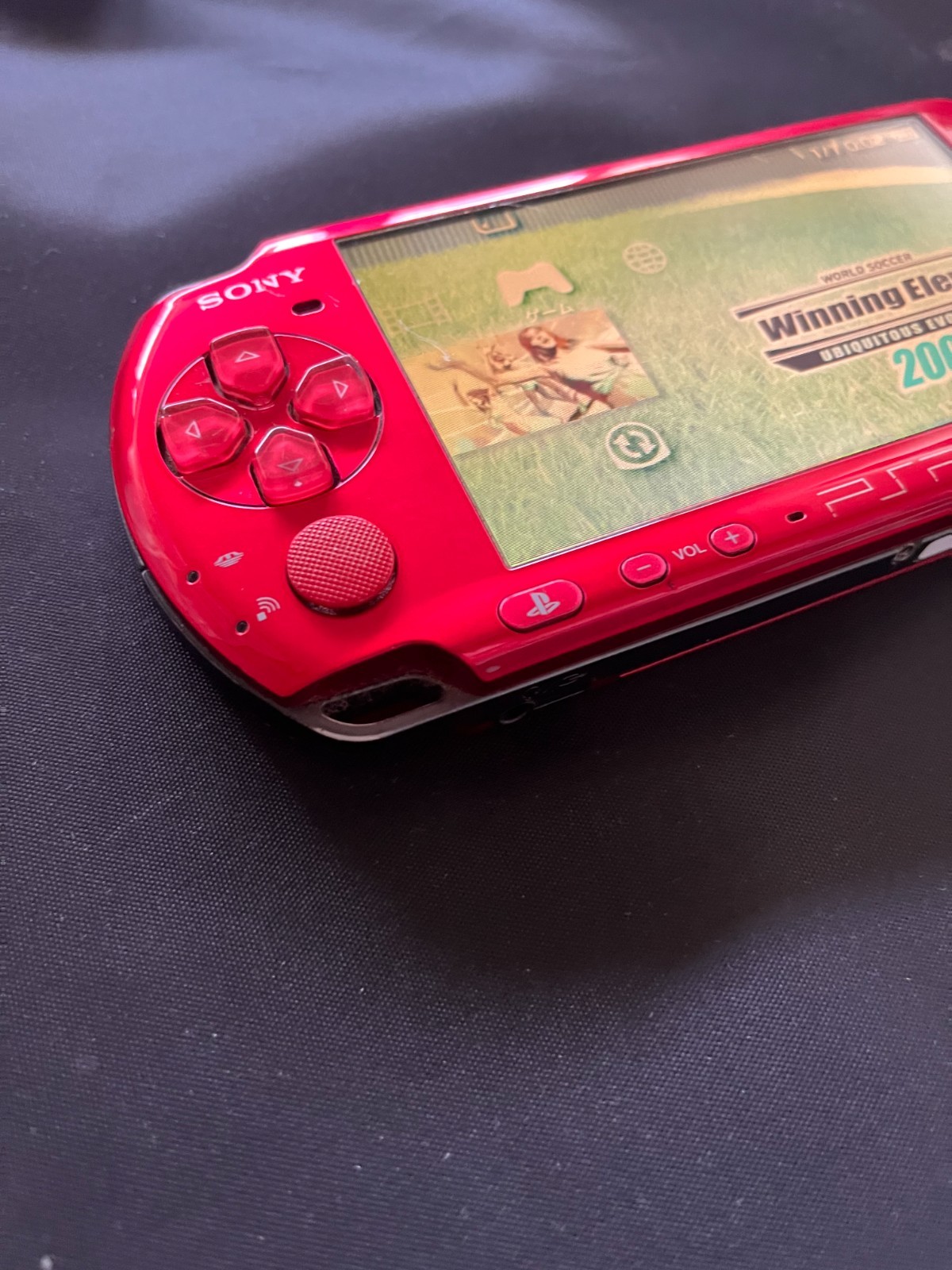 SONY PSP-3000 Radiant Red + AC charger + 8GB Memory – Working, Rank B