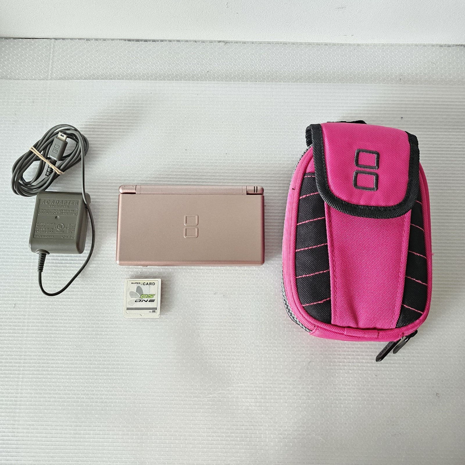 Nintendo DS Lite Metallic Rose Pink Handheld Console Model USG-001 – 2006
