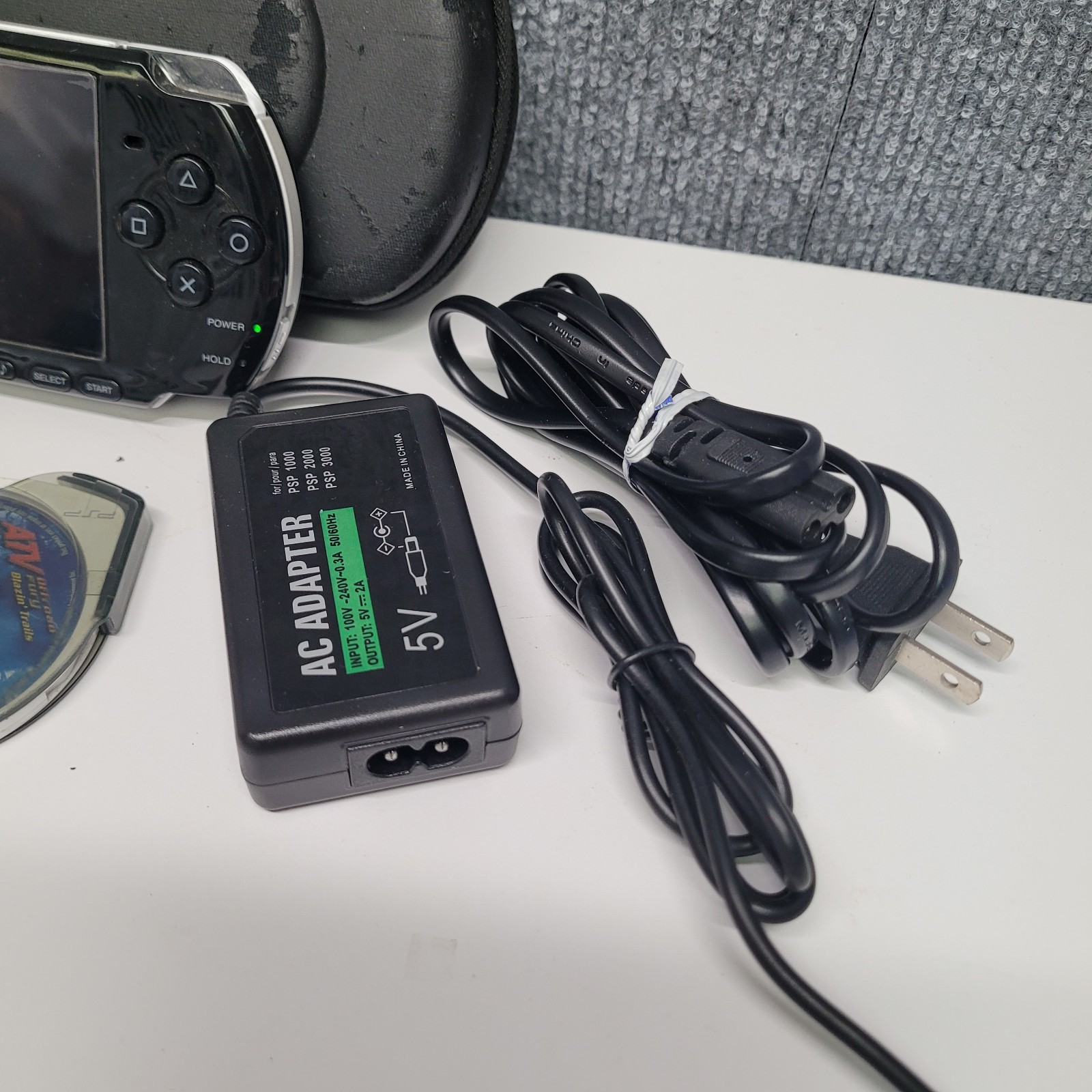 Sony PSP-3001 & PSP-1001 System Bundle W/ Storage, Game, DVD and Charger Read!