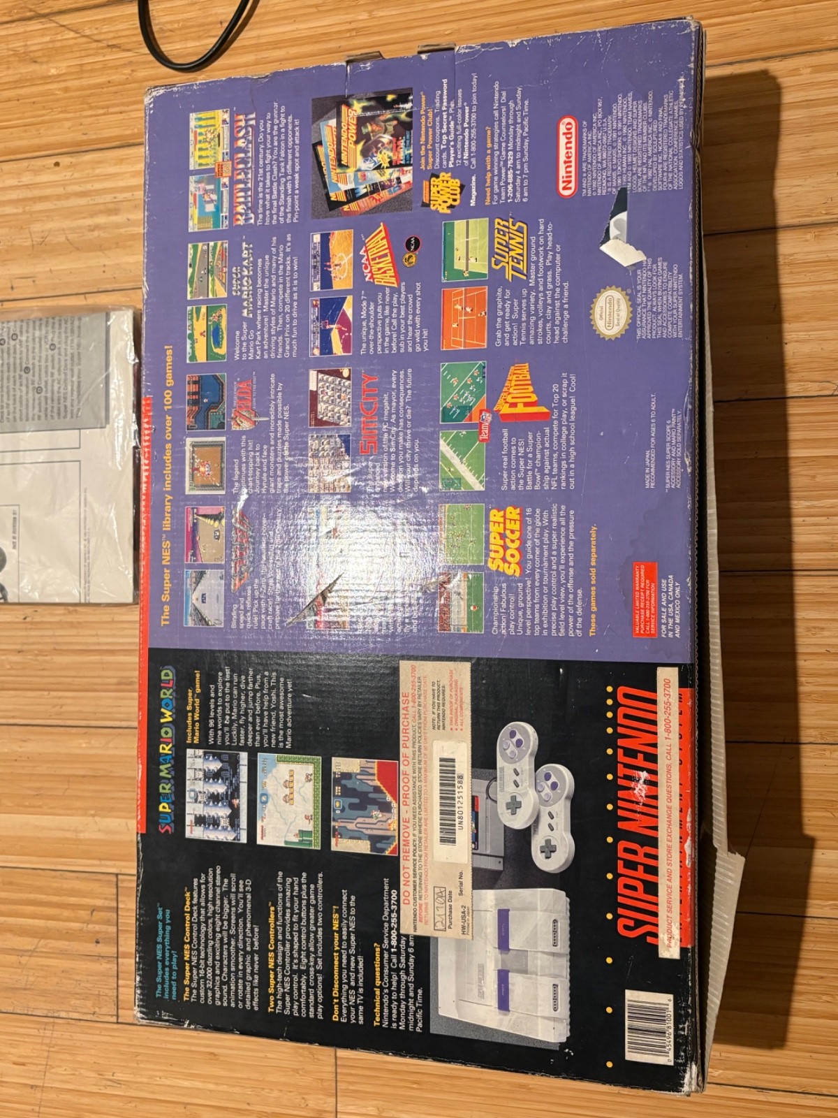 Super Nintendo Console with box and two games, two controllers & manual
