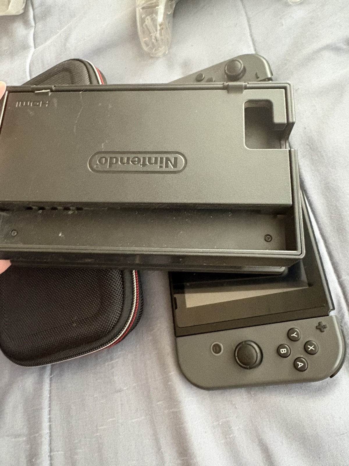 Nintendo Switch Handheld Console Gray Joy-Cons with dock and a case.