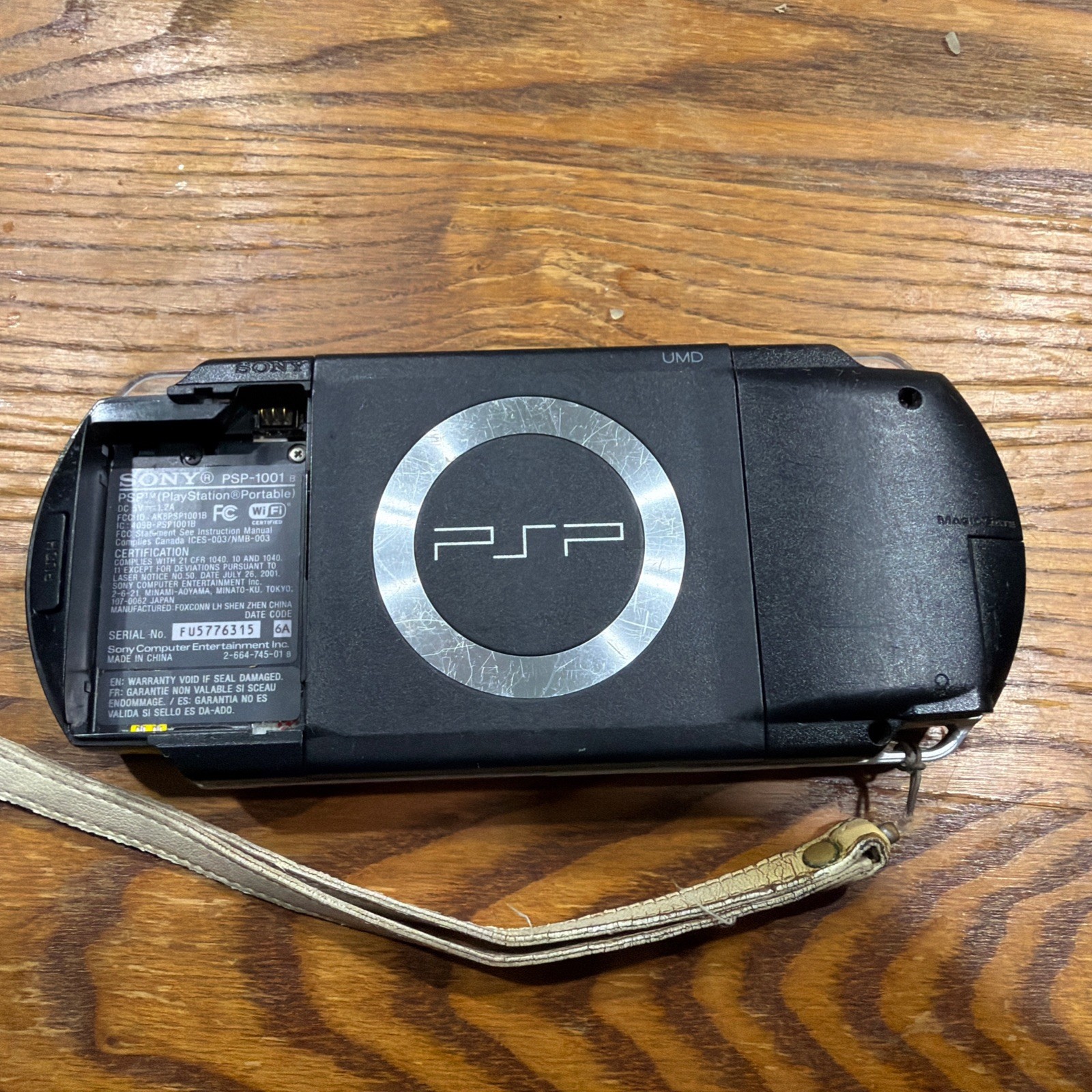 PSP 1001 – Missing Battery – Needs Charger Cord – Comes w/ Games – See Disc.