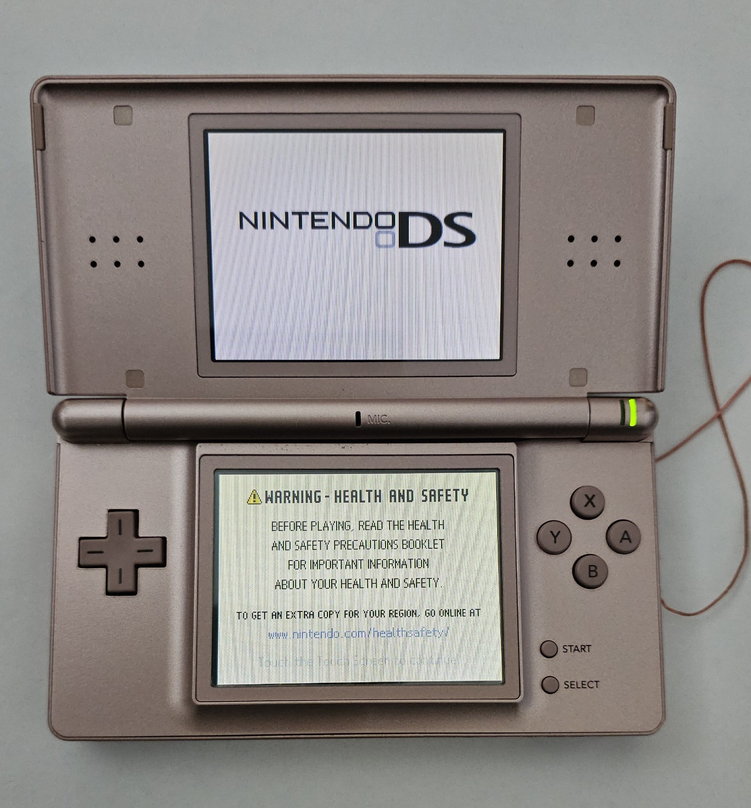 Nintendo DS Lite Nintendogs Console Metallic Rose with charger and extras