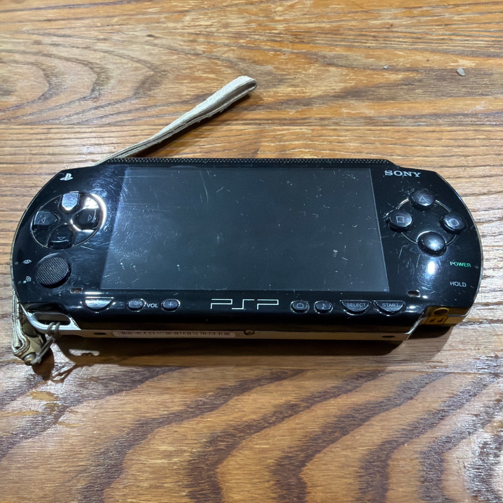 PSP 1001 – Missing Battery – Needs Charger Cord – Comes w/ Games – See Disc.