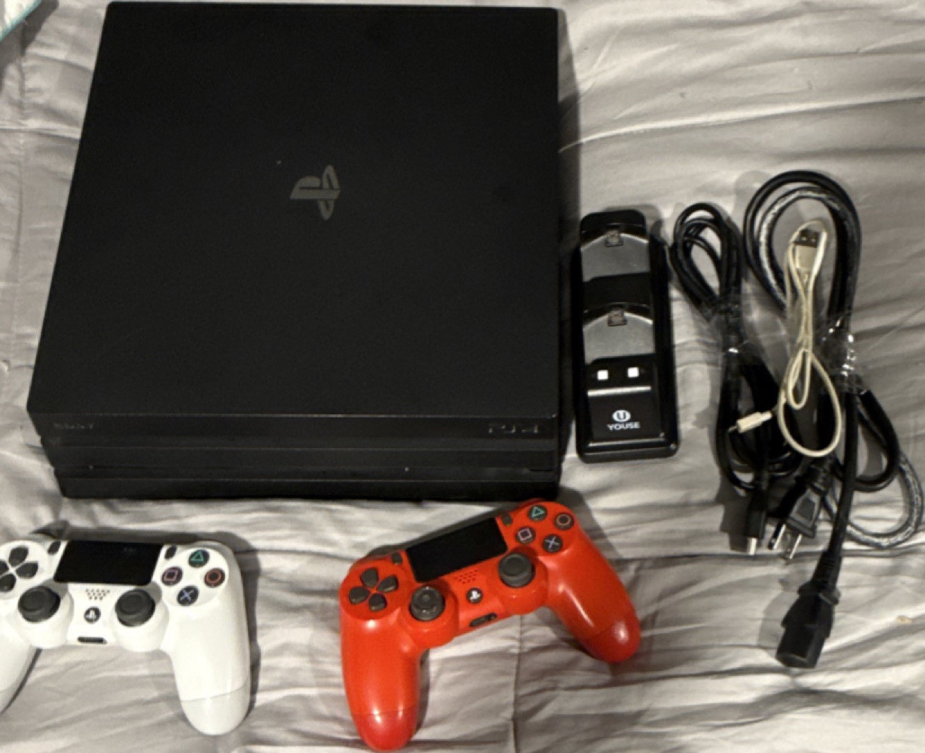 Sony PlayStation 4 Pro Console with Controllers, Charging Dock & Cables