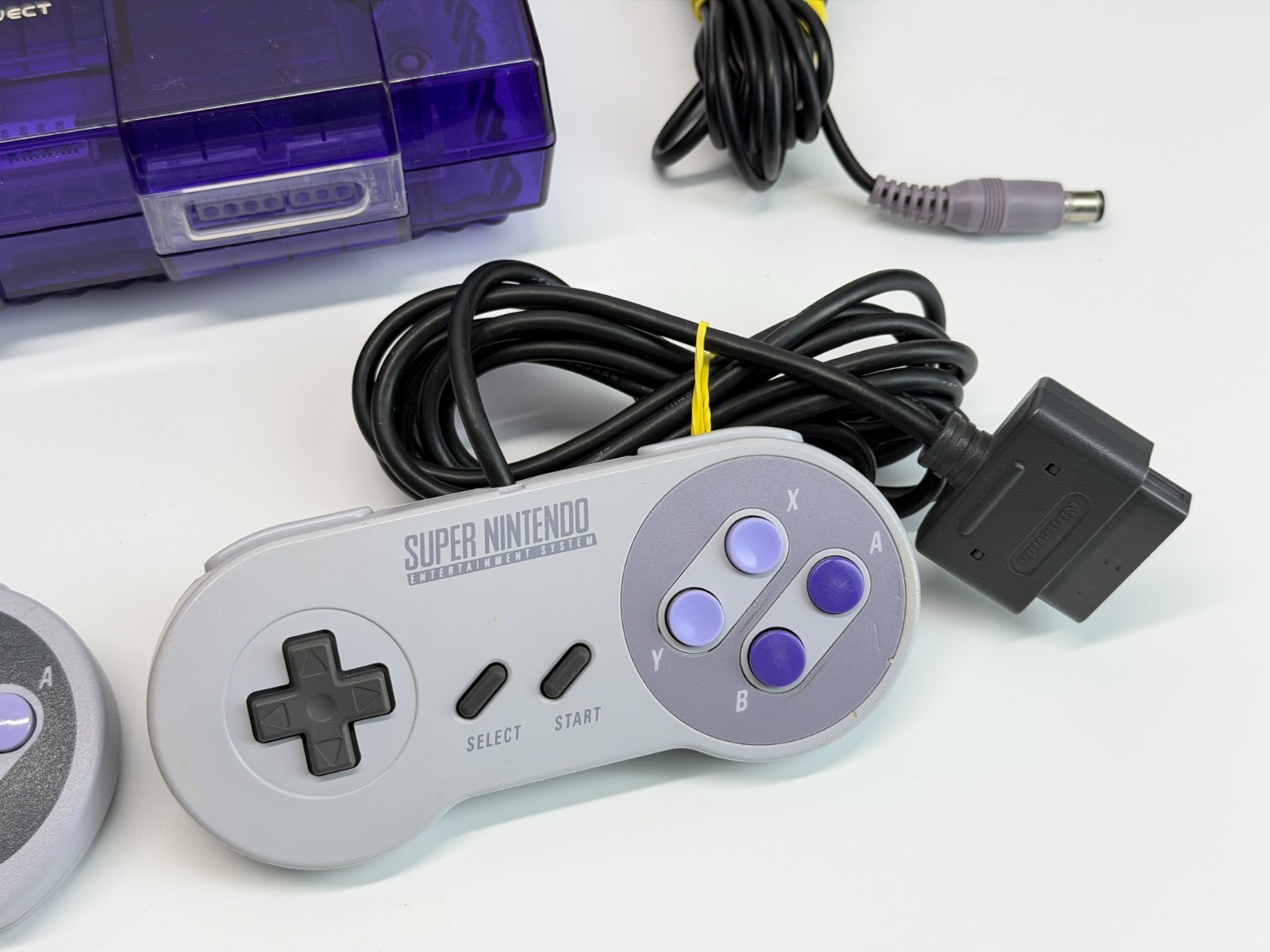Super Nintendo – New Clear Purple Shell – System Bundle w/Super Mario World