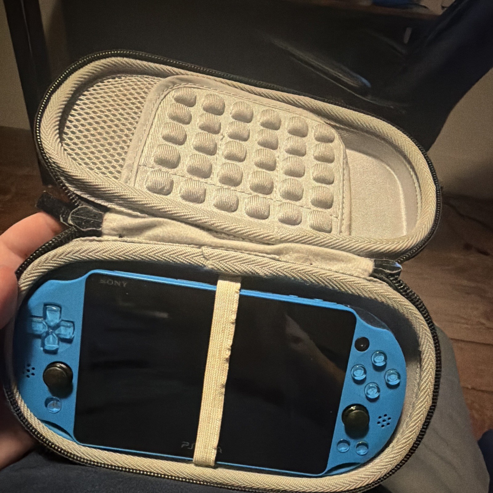 Sony PlayStation Vita Handheld System Blue/Black with Carrying Case