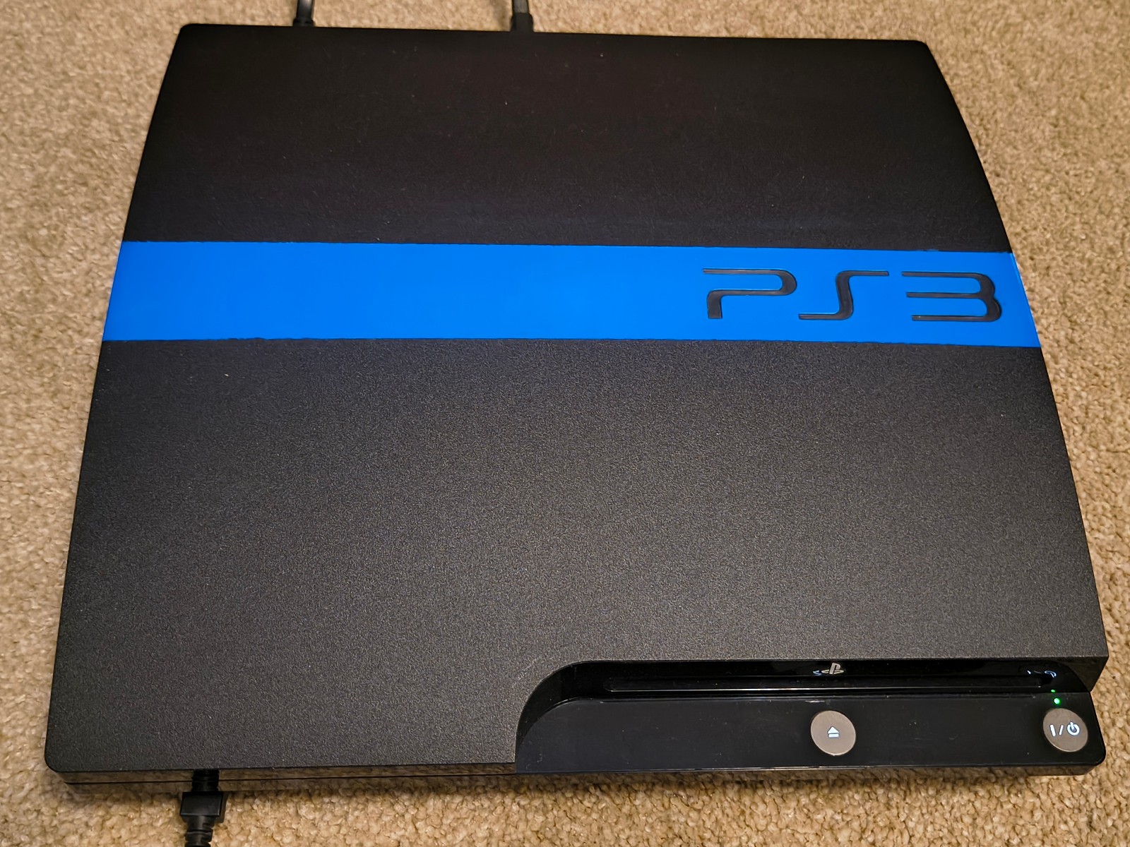 Sony PlayStation 3 Slim 120GB Console Bundle – 8 games, 2 controllers, cables