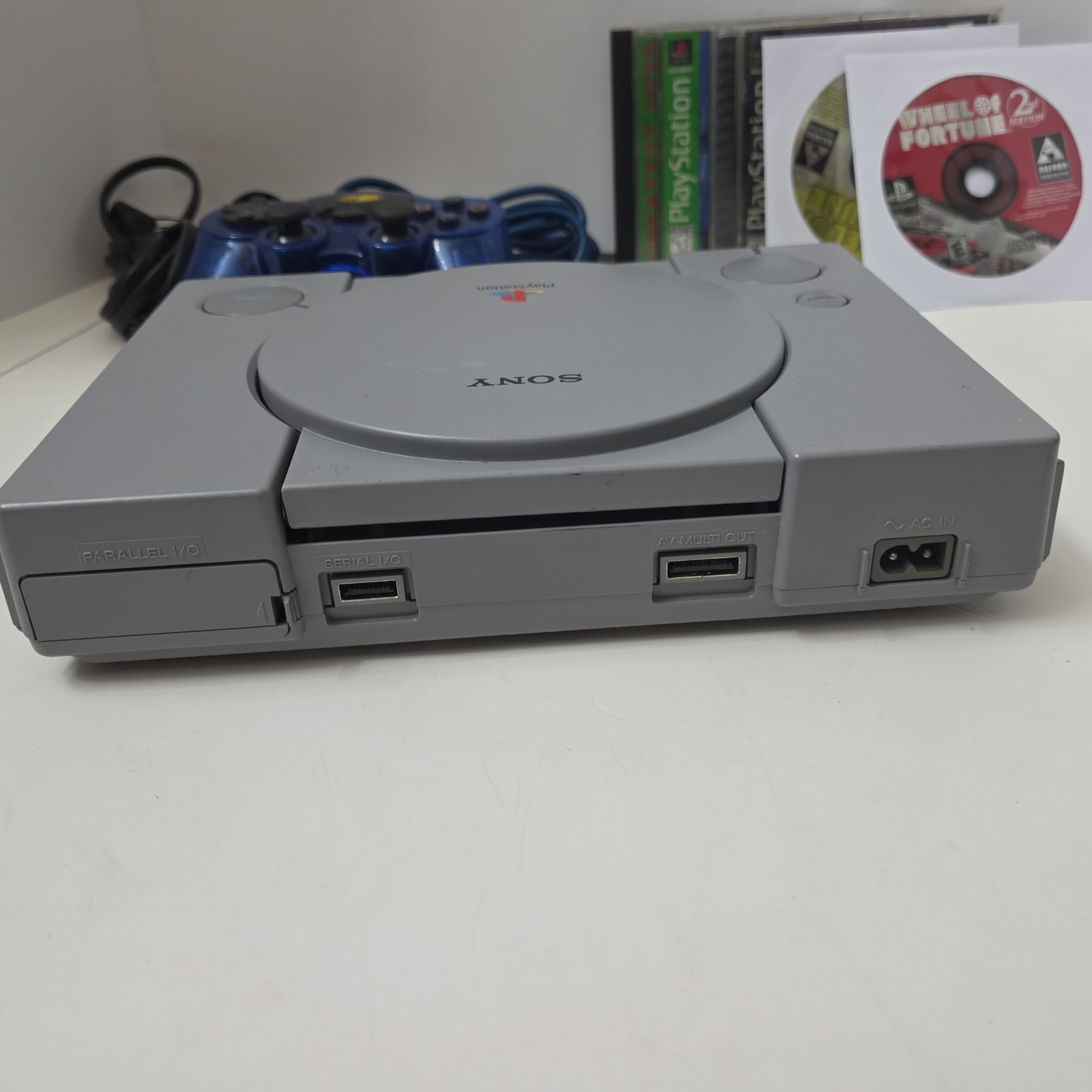 Sony Playstation 1 PS1 Console Bundle 8 Games, Remote, Power + AV Tested