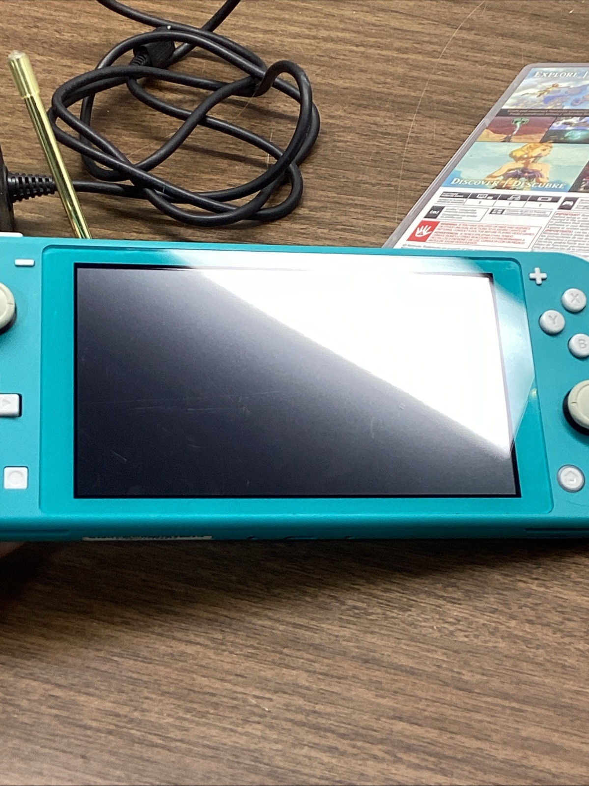 Nintendo Switch Lite Turquoise Teal Handheld Console Bundle with Zelda Game