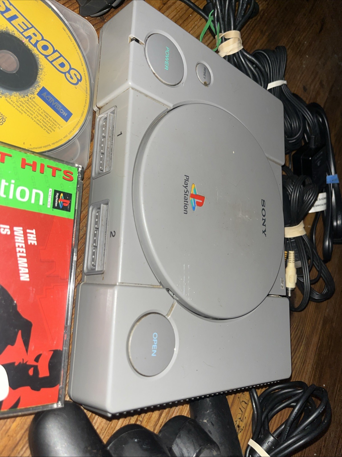 Sony Playstation 1 Gray Console With Games Controllers, A/V Cable, and Power