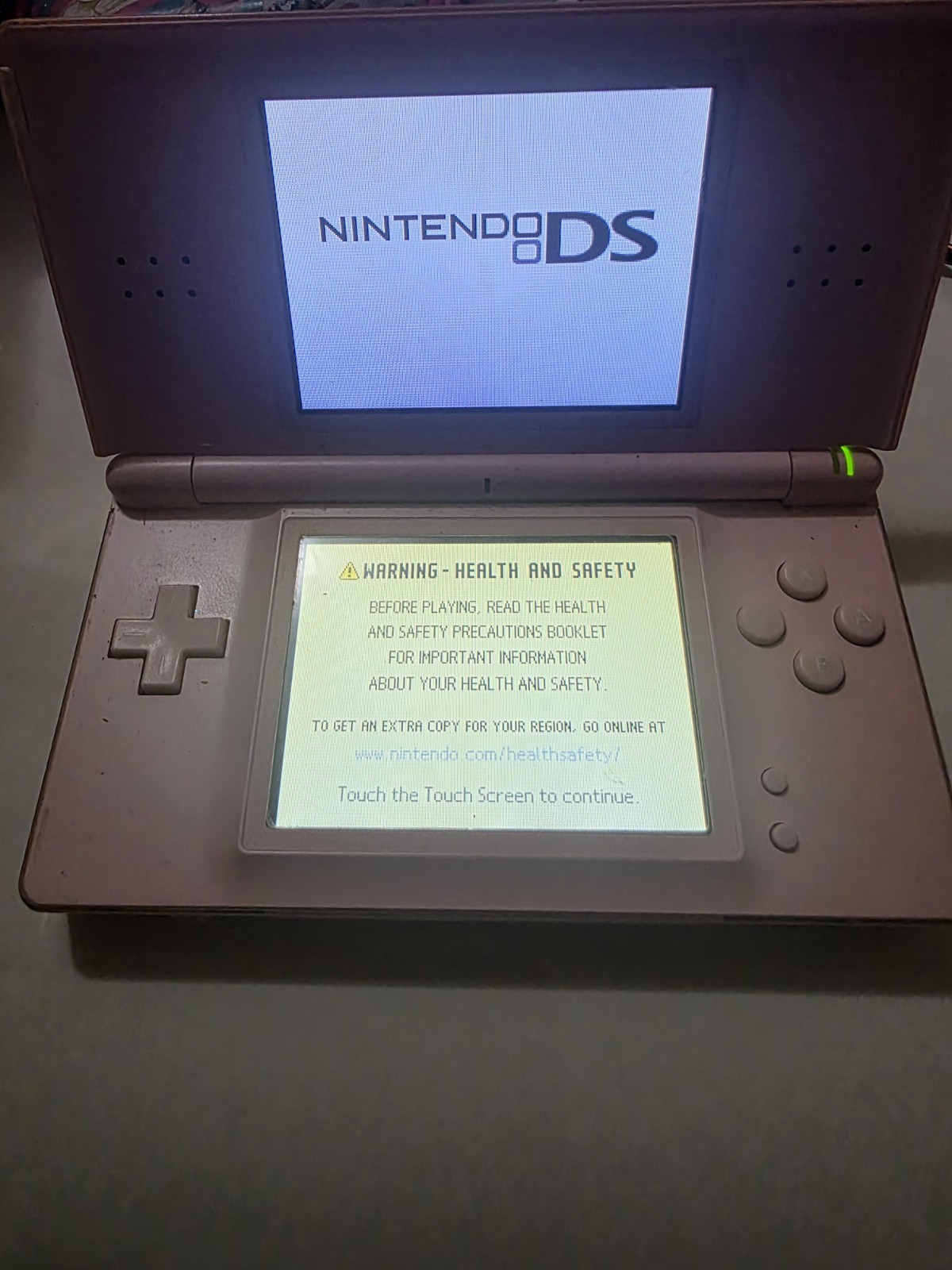 Nintendo DS Lite Pink Handheld Console w/ Case Charger Not Included Working.