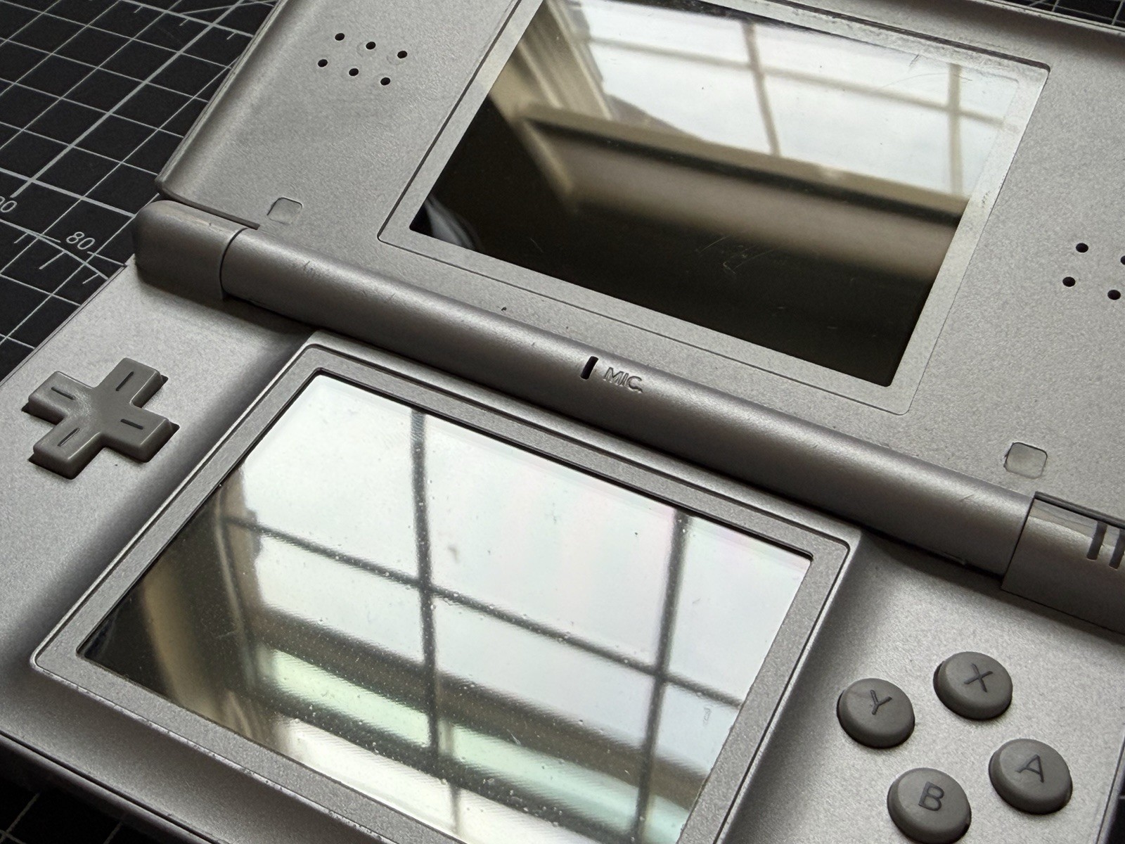 Nintendo DS Lite Used OEM Silver W/ R4 & 2GB SD – 100% Tested Region Free