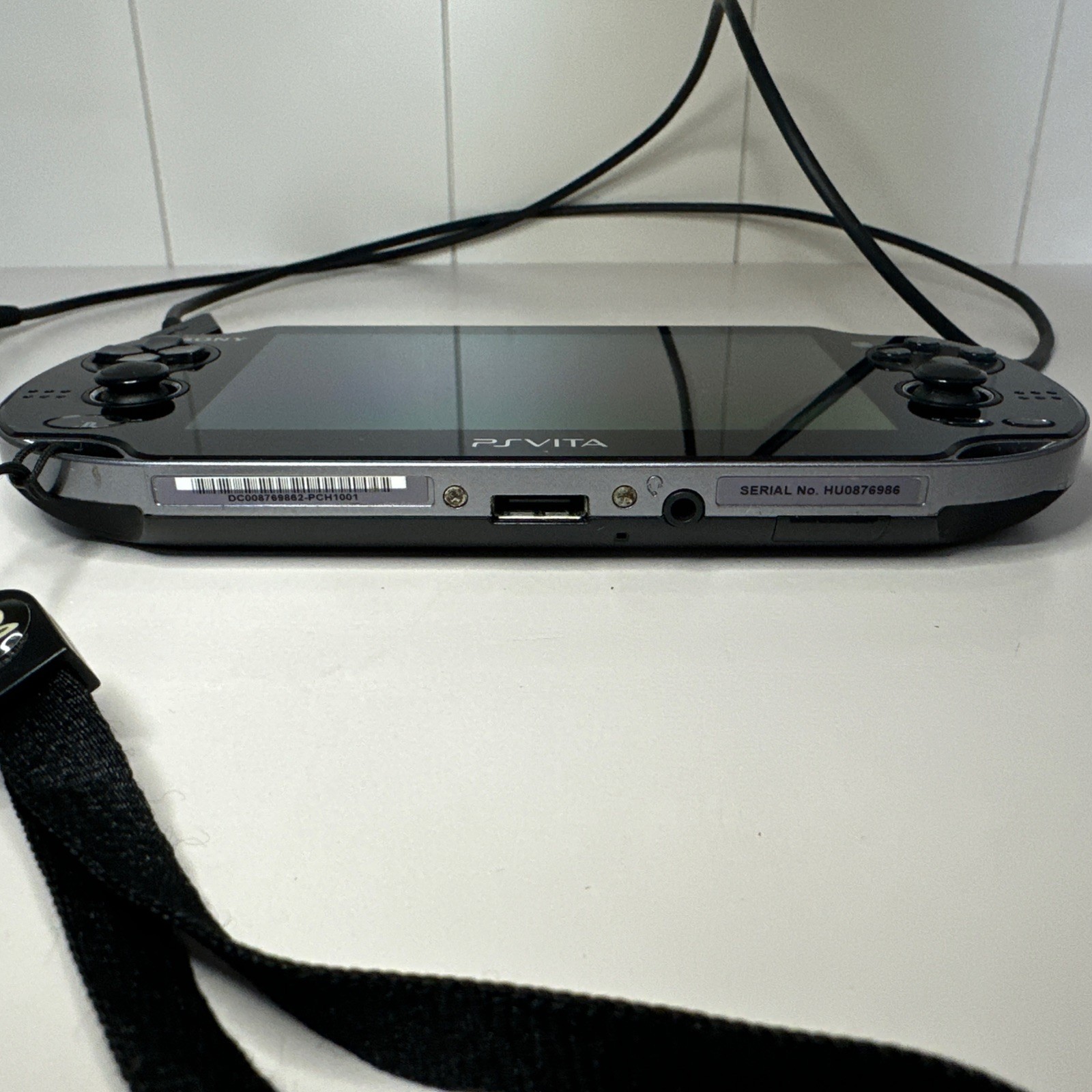 Sony PS Vita PCH-1101 Limited Edition Handheld System – Crystal Black With Game.
