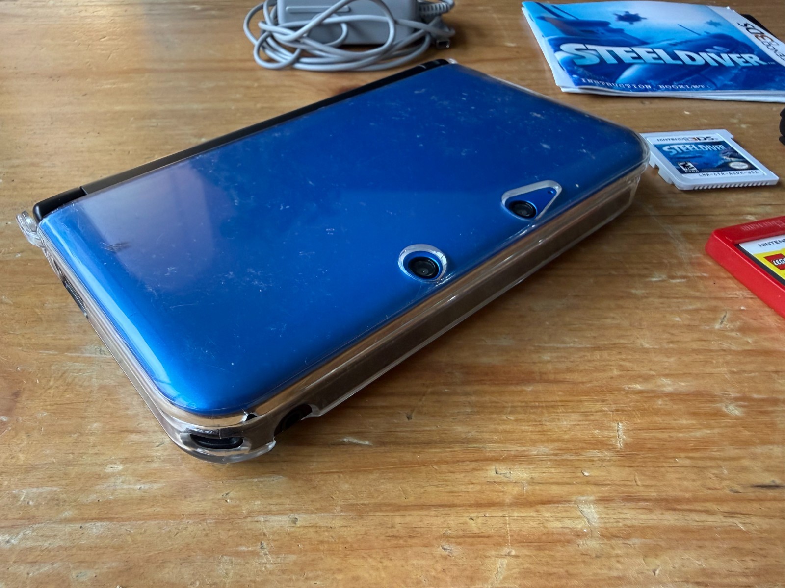 Nintendo 3DS XL Blue/Black – Tested w/ Case, Charger, 4 Games, Stand