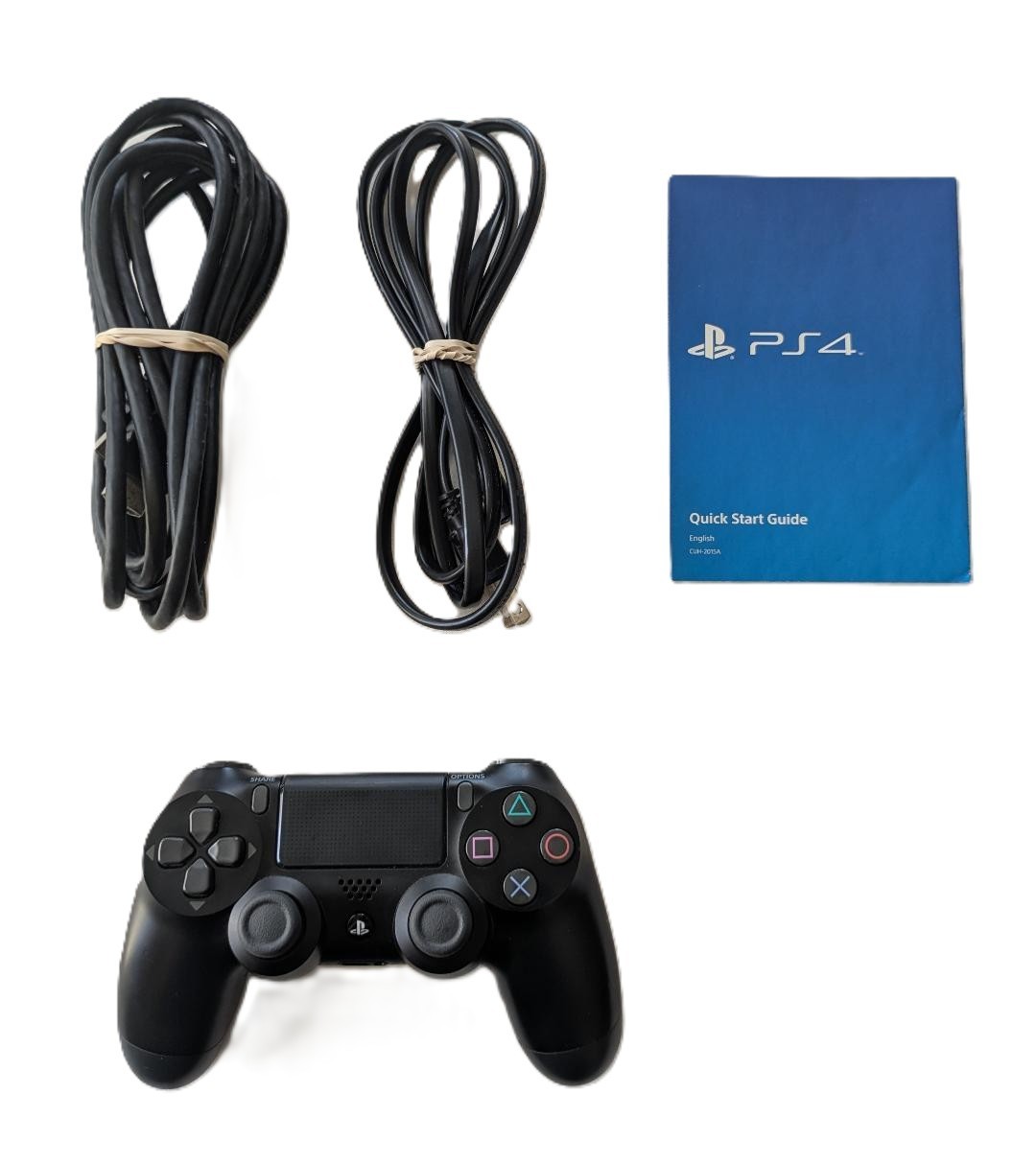 PS4 500GB Console, used in box, includes controller and cords, game NOT included