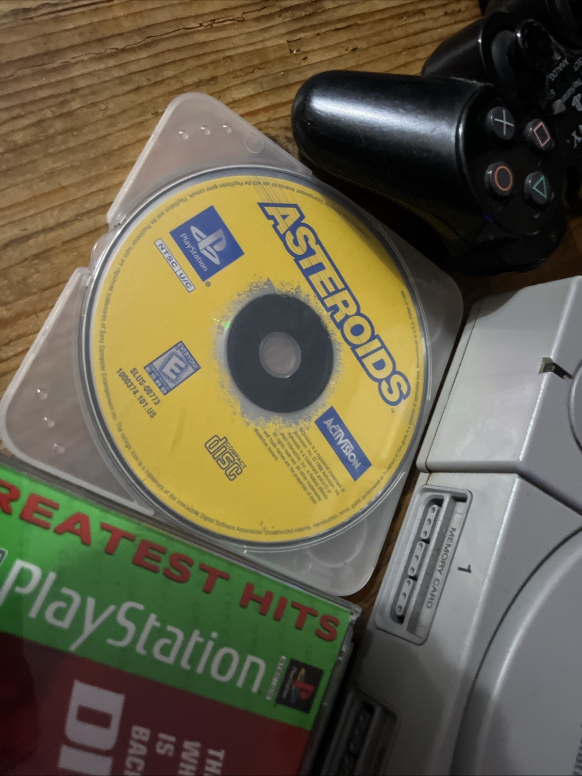 Sony Playstation 1 Gray Console With Games Controllers, A/V Cable, and Power