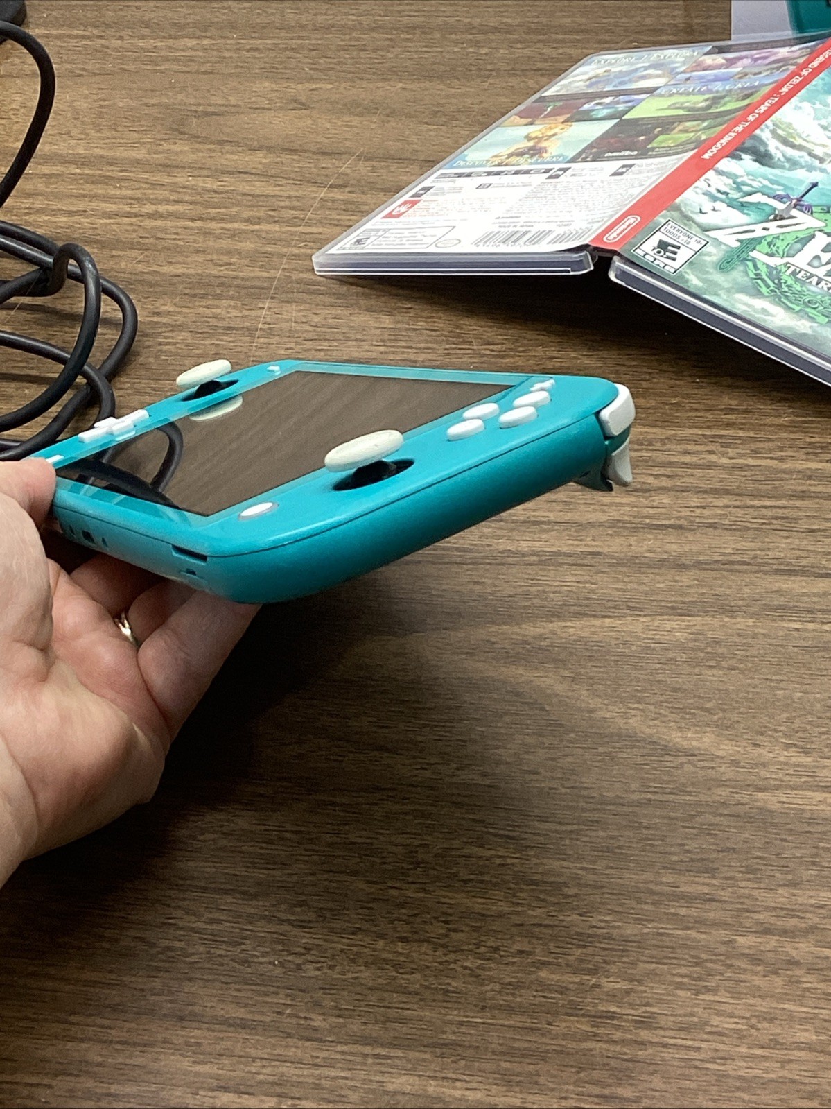 Nintendo Switch Lite Turquoise Teal Handheld Console Bundle with Zelda Game