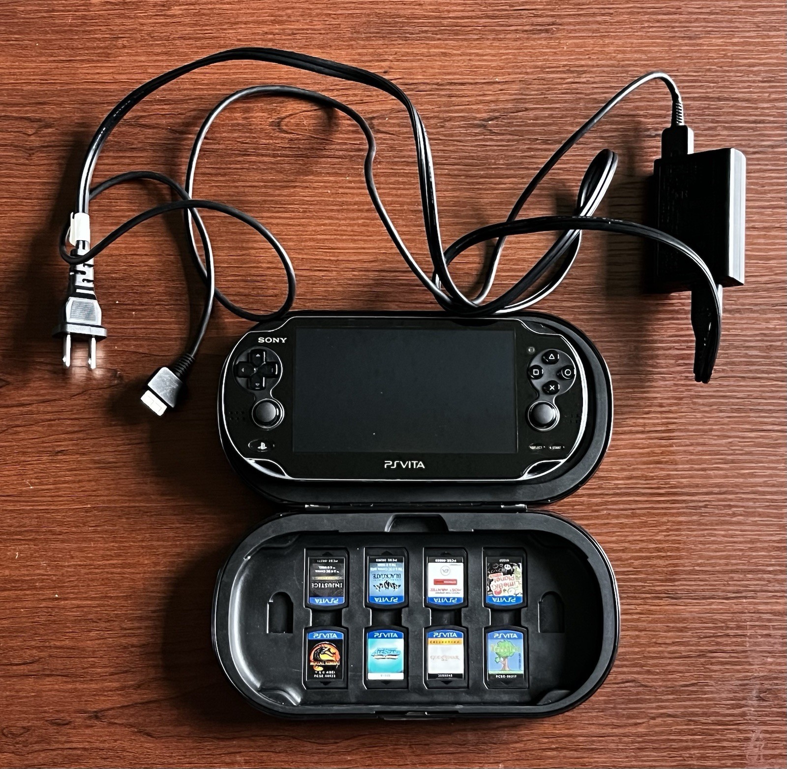 Sony Playstation PS Vita, 8 Game Bundle, 16GB Memory Card & Charger PCH-1001
