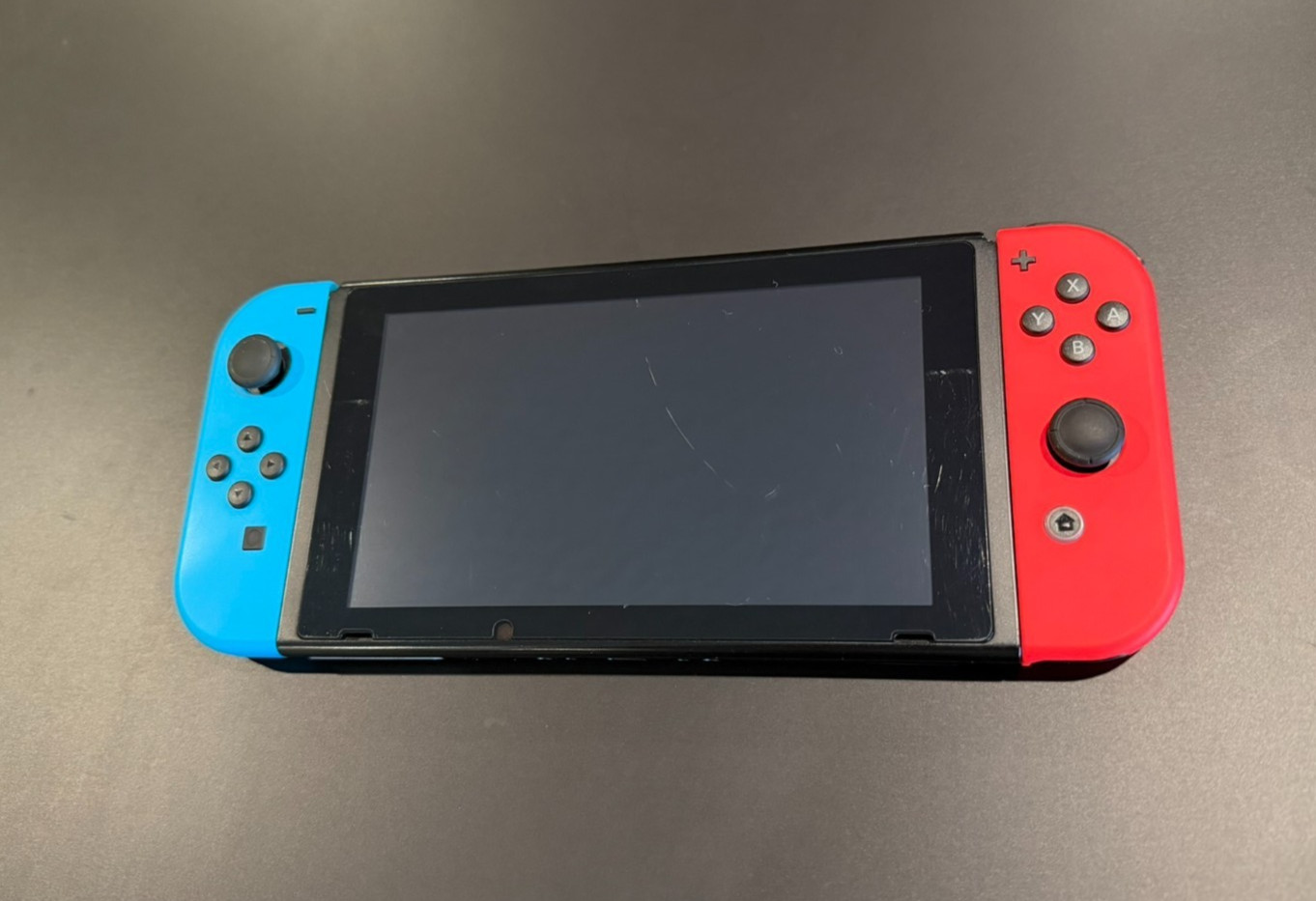 Nintendo Switch V1 HAC-001 XAW1 – Blue/ Red JoyCons with accessories