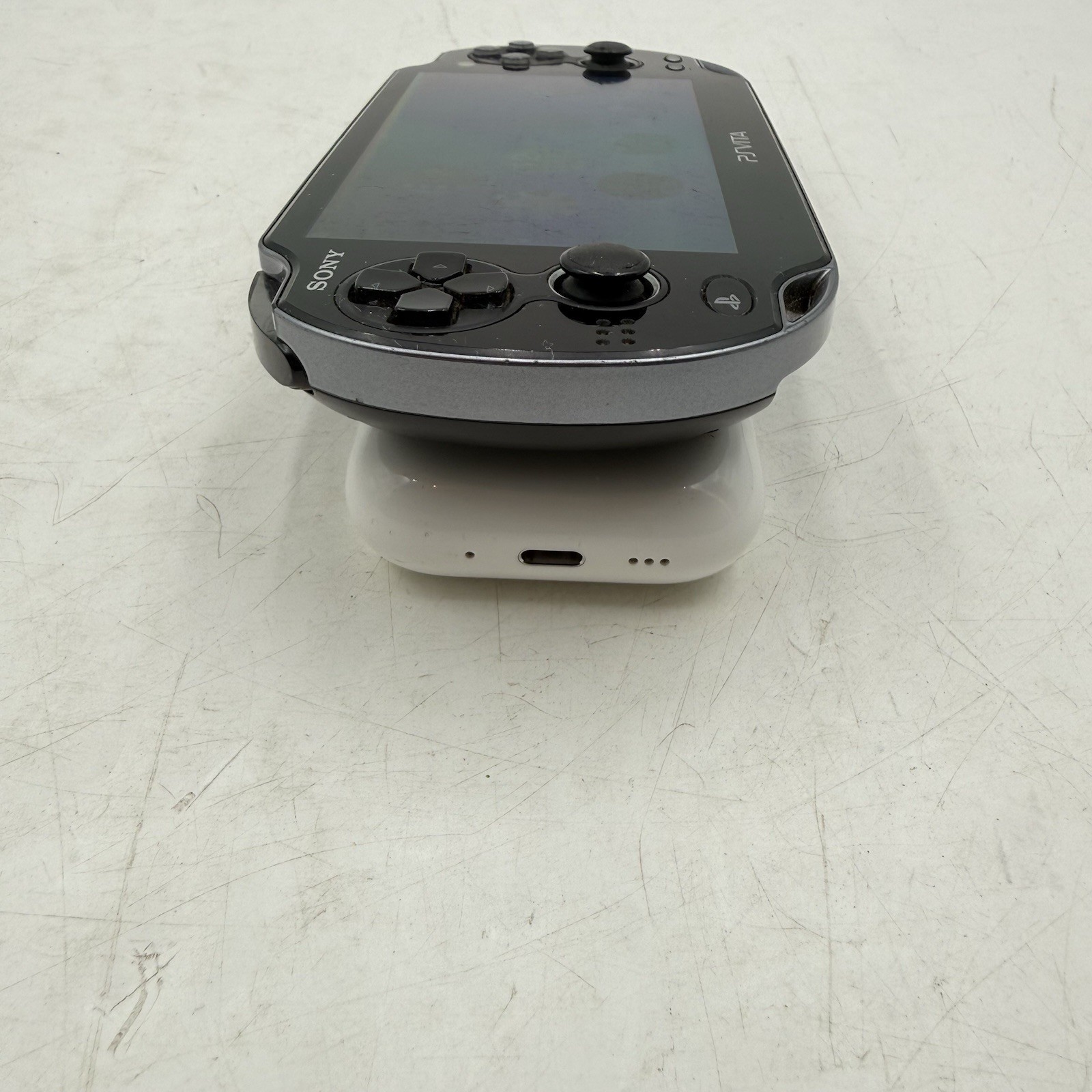 Sony PlayStation PS Vita PCH-1001 Black Handheld Console. With 2 Game Downloaded
