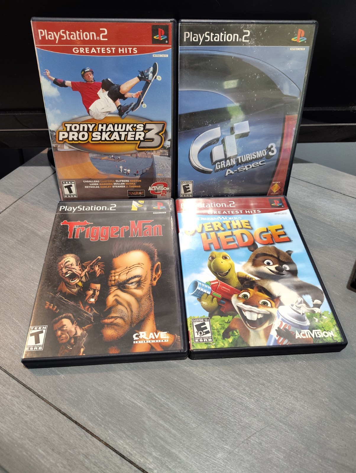 Sony PlayStation 2 Slim SCPH70012 –New Laser–All Cables, 4 Games-Controller