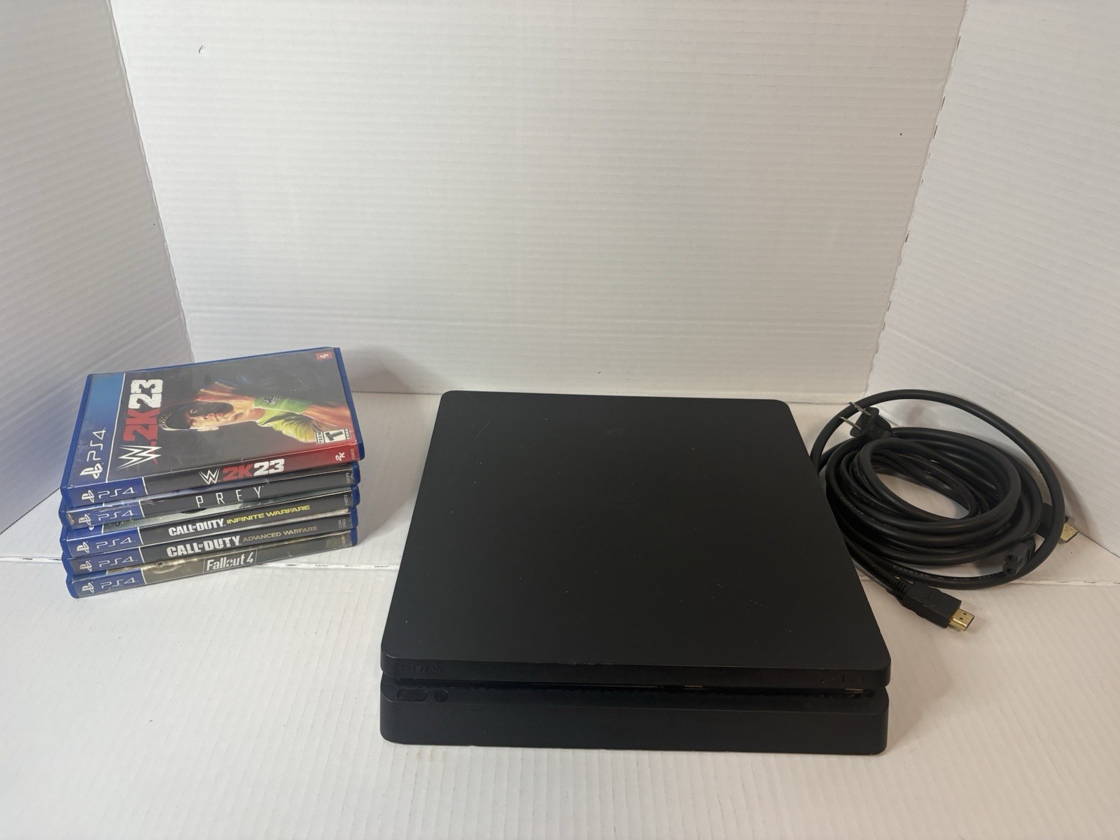 Sony PlayStation 4 Slim – 1TB Console – Black W 5 Games