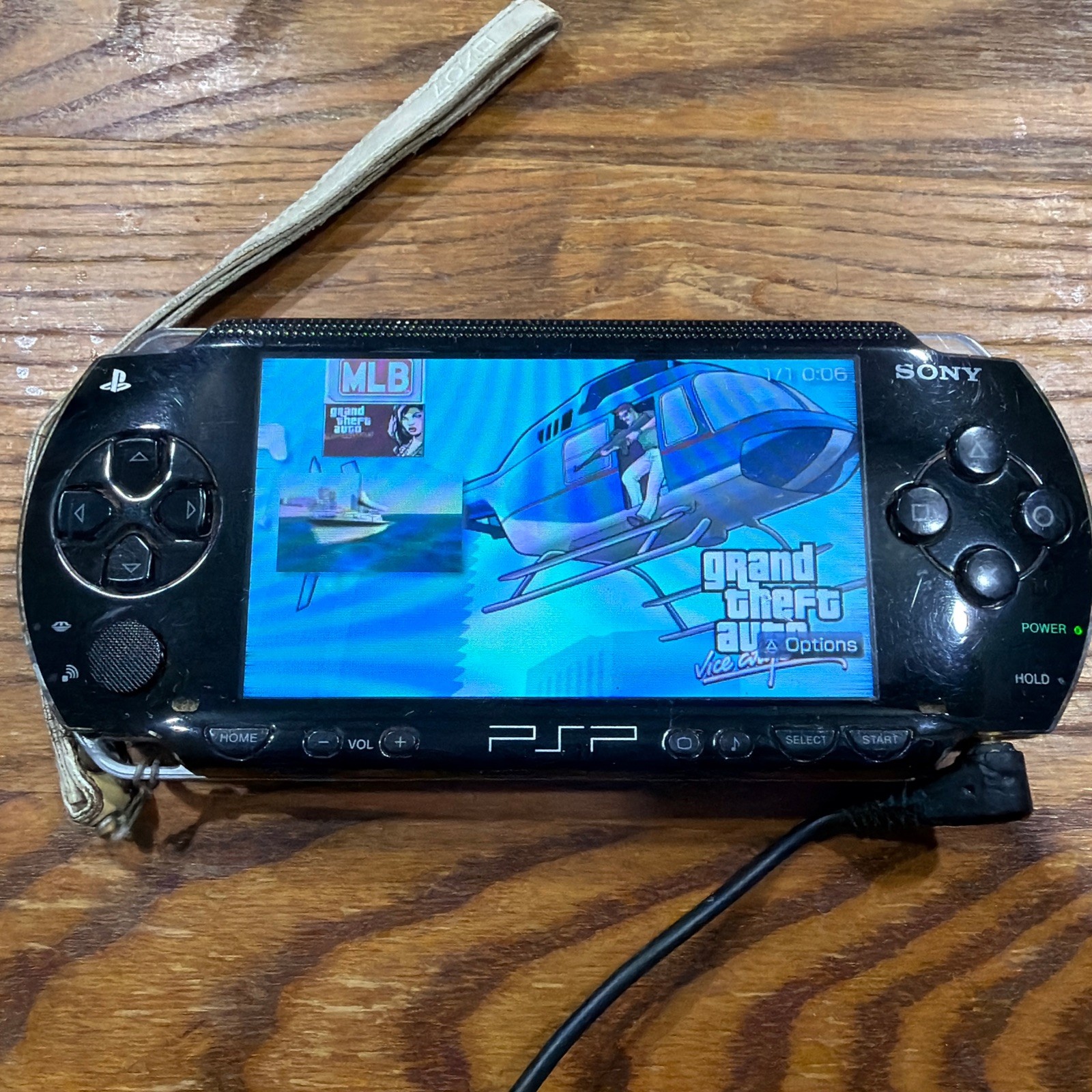 PSP 1001 – Missing Battery – Needs Charger Cord – Comes w/ Games – See Disc.