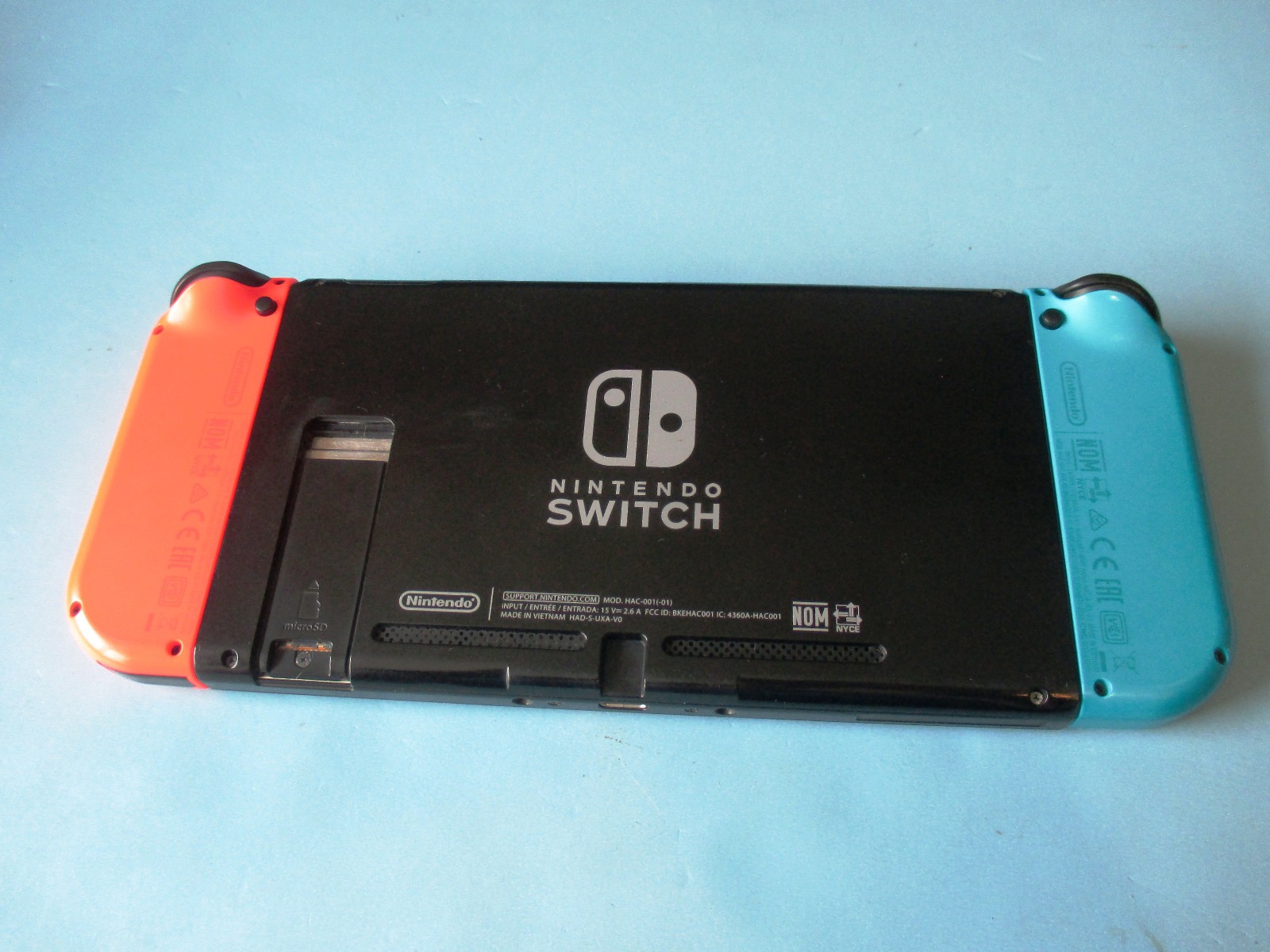 Nintendo Switch System Console w/Neon Red & Blue Joy-Cons + Dock & Extras