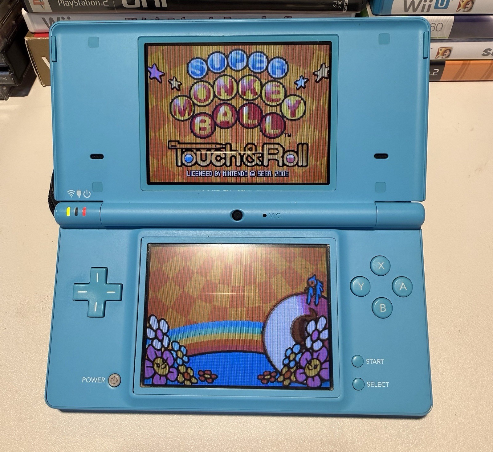 Nintendo DSi Aqua Blue Handheld Console Stylus Charger Monkeyball Tested Works